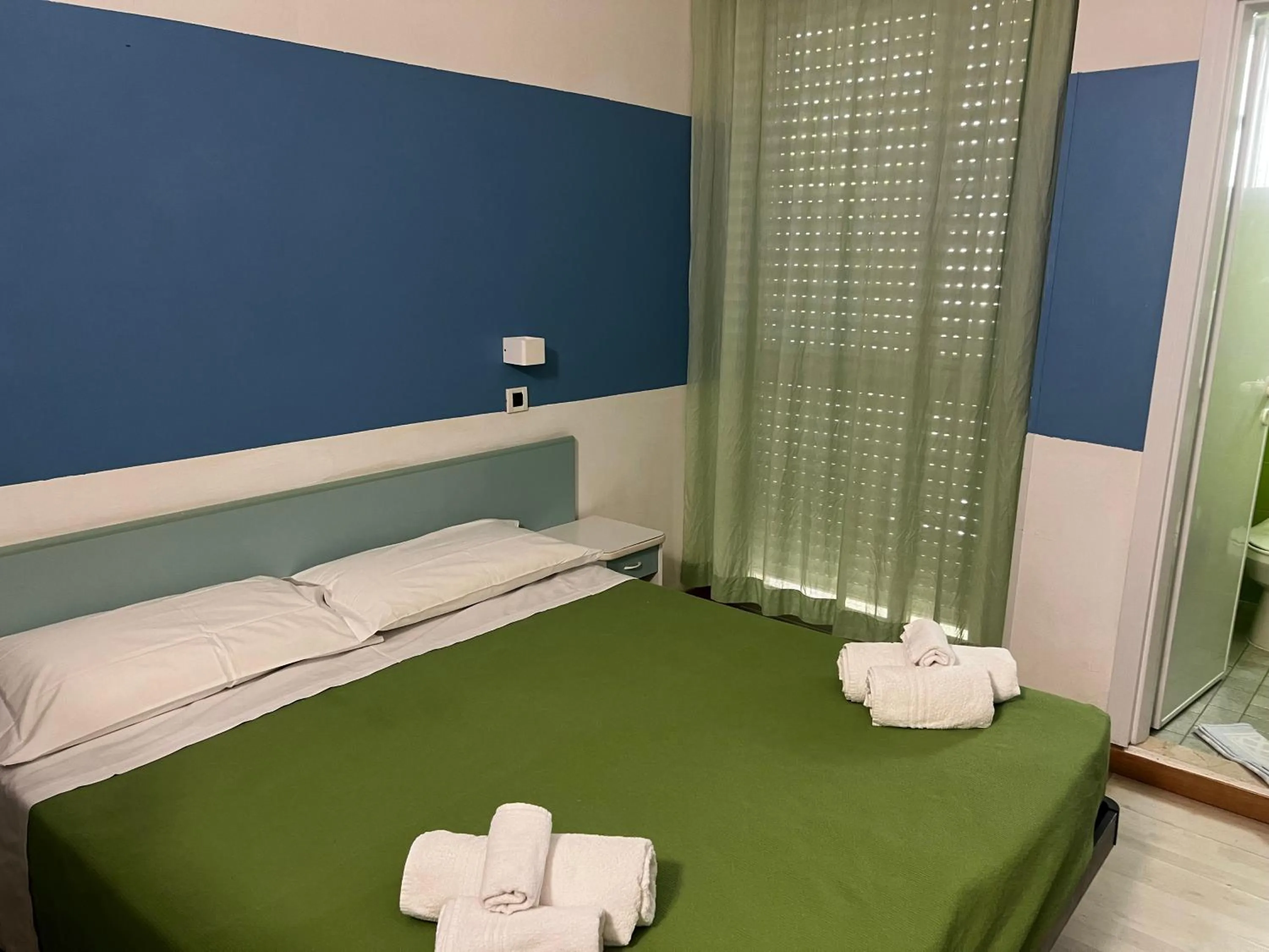 Bed in Hotel Napoleon