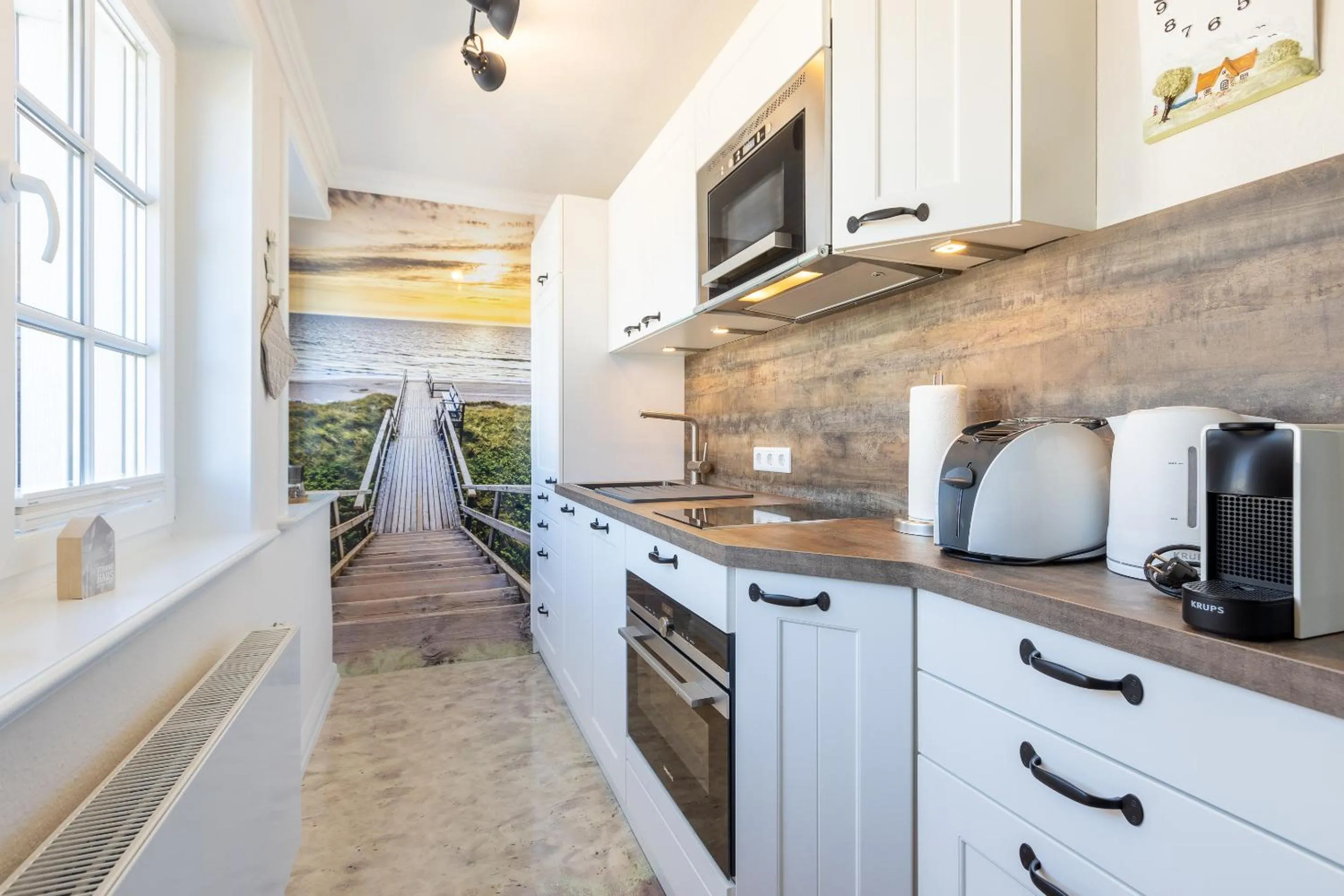 Kitchen or kitchenette in Haus am Meer Strandmuschel
