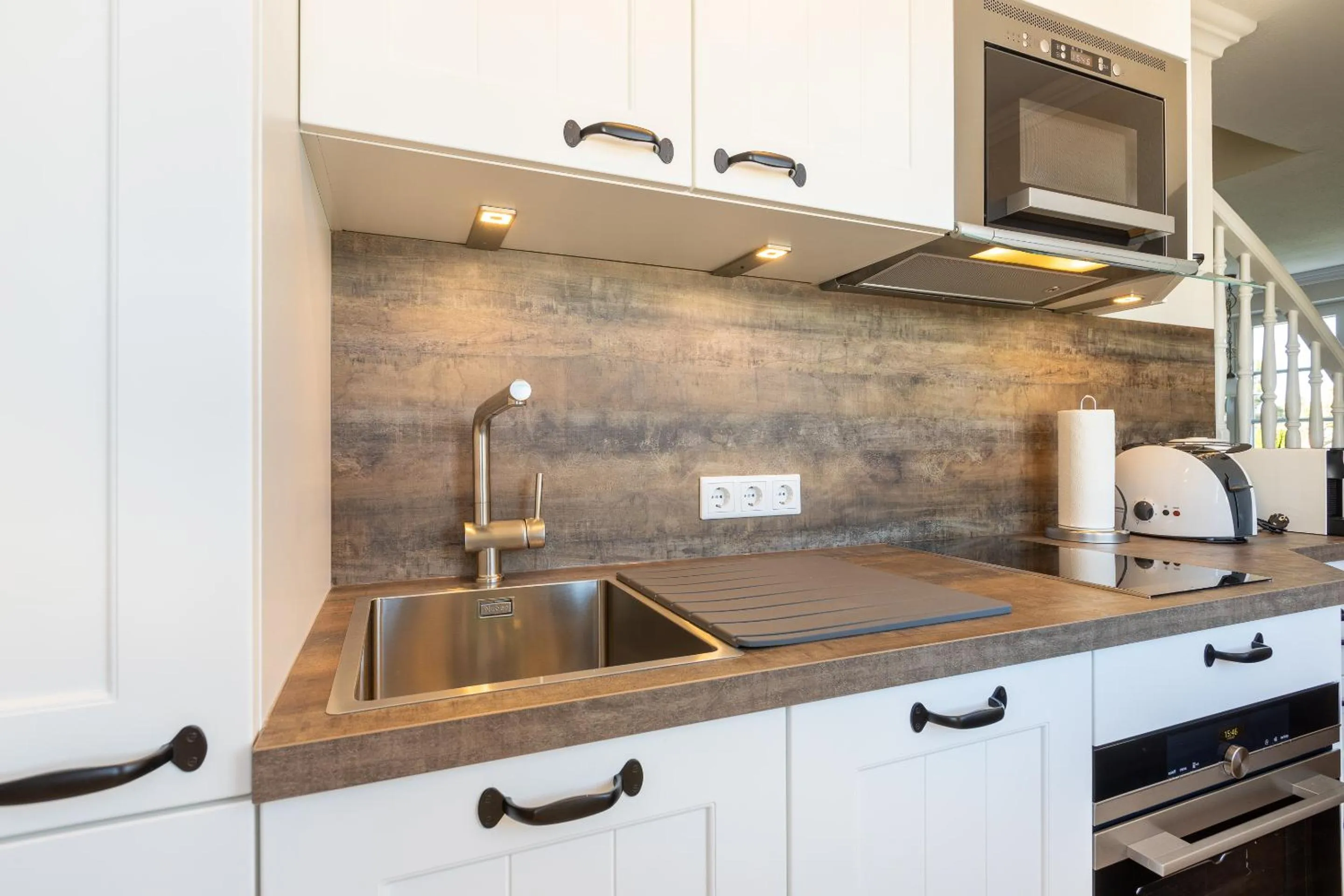 Kitchen or kitchenette in Haus am Meer Strandmuschel
