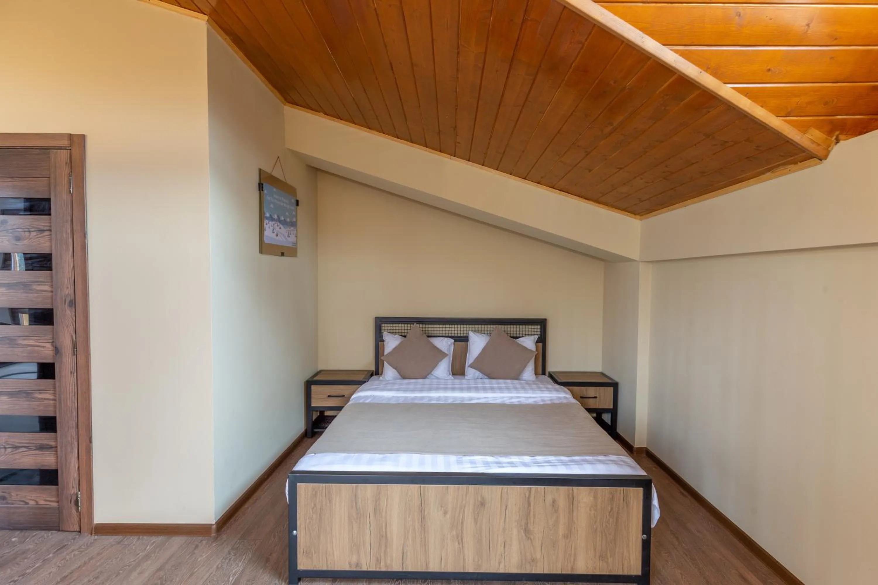 Bed in Pine Chalets by KA Group