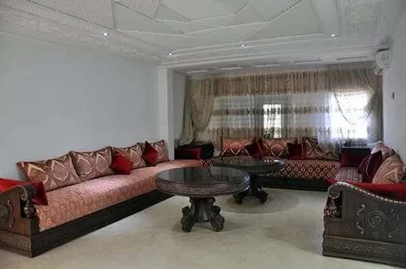 Communal lounge/ TV room in HOTEL BEAUTIFUL