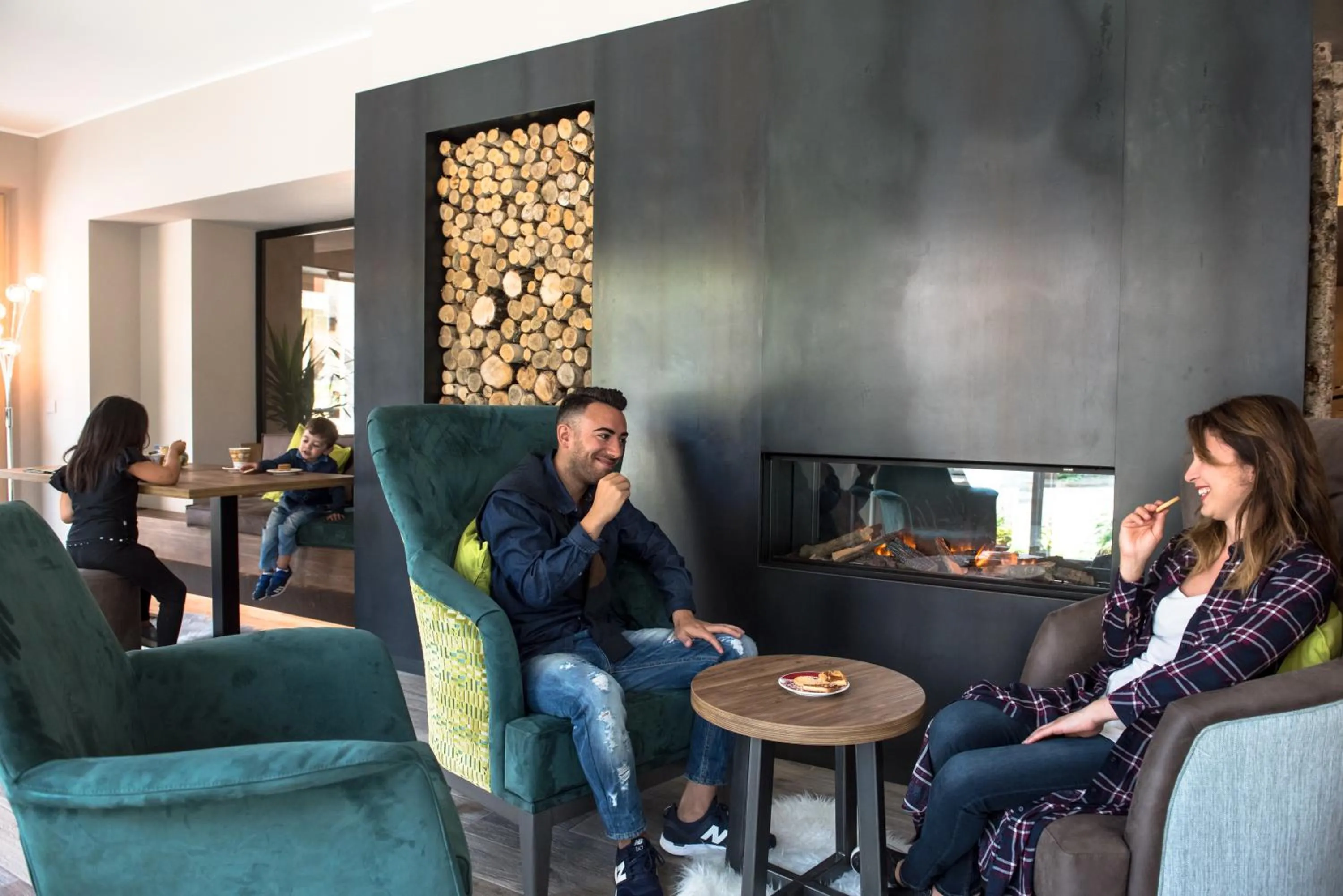 Communal lounge/ TV room in Harmony Suite Hotel