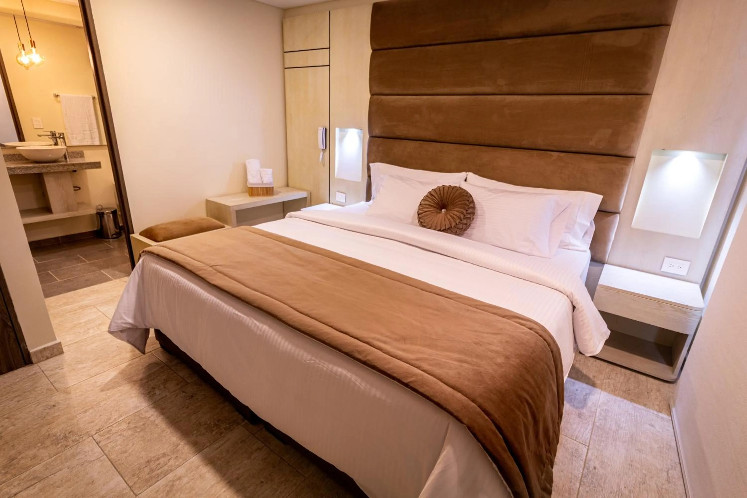 Bed in Trugo Luxury Rooms