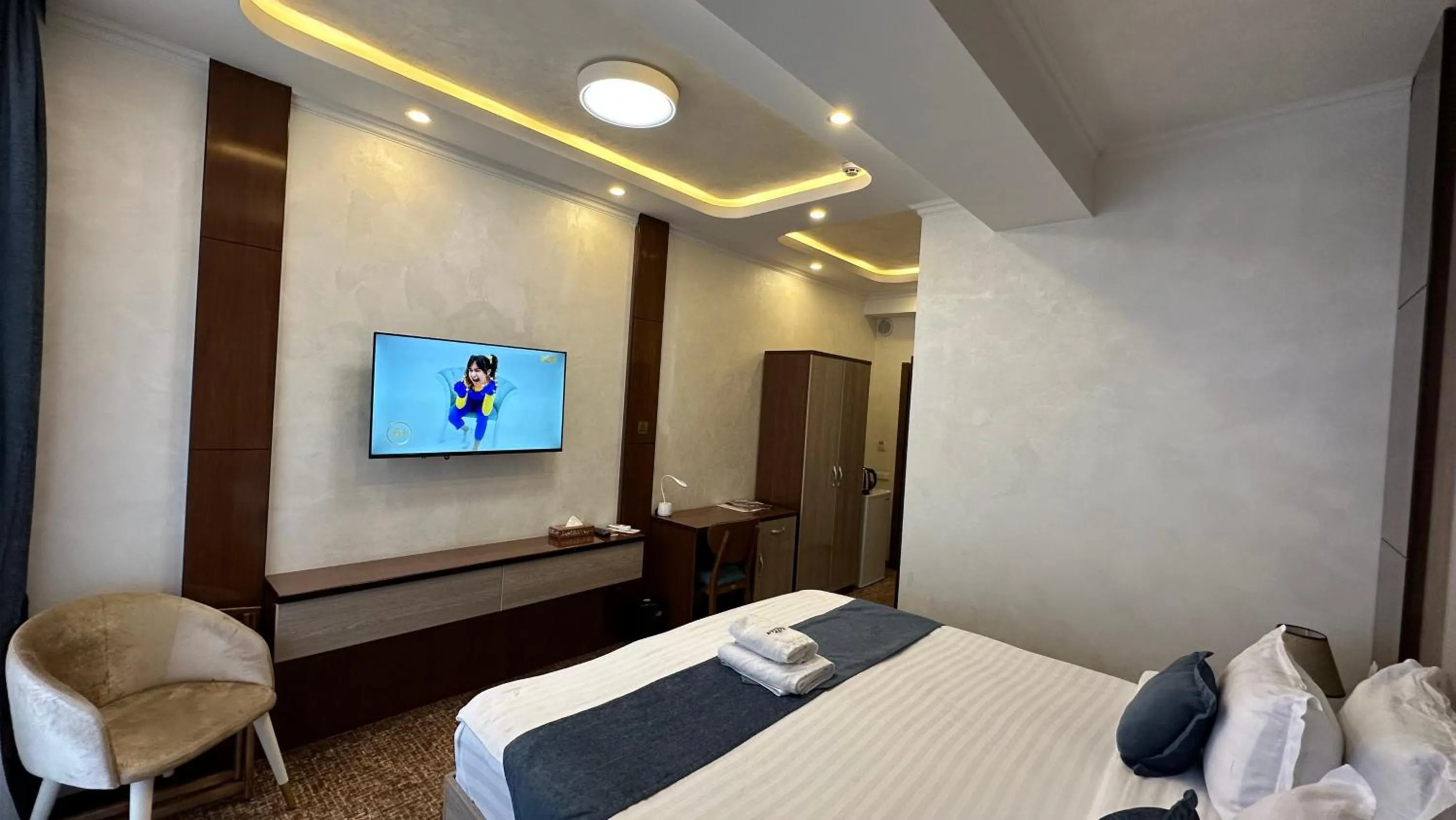 Communal lounge/ TV room, Bed in Rayyan Hotel & SPA Tashkent