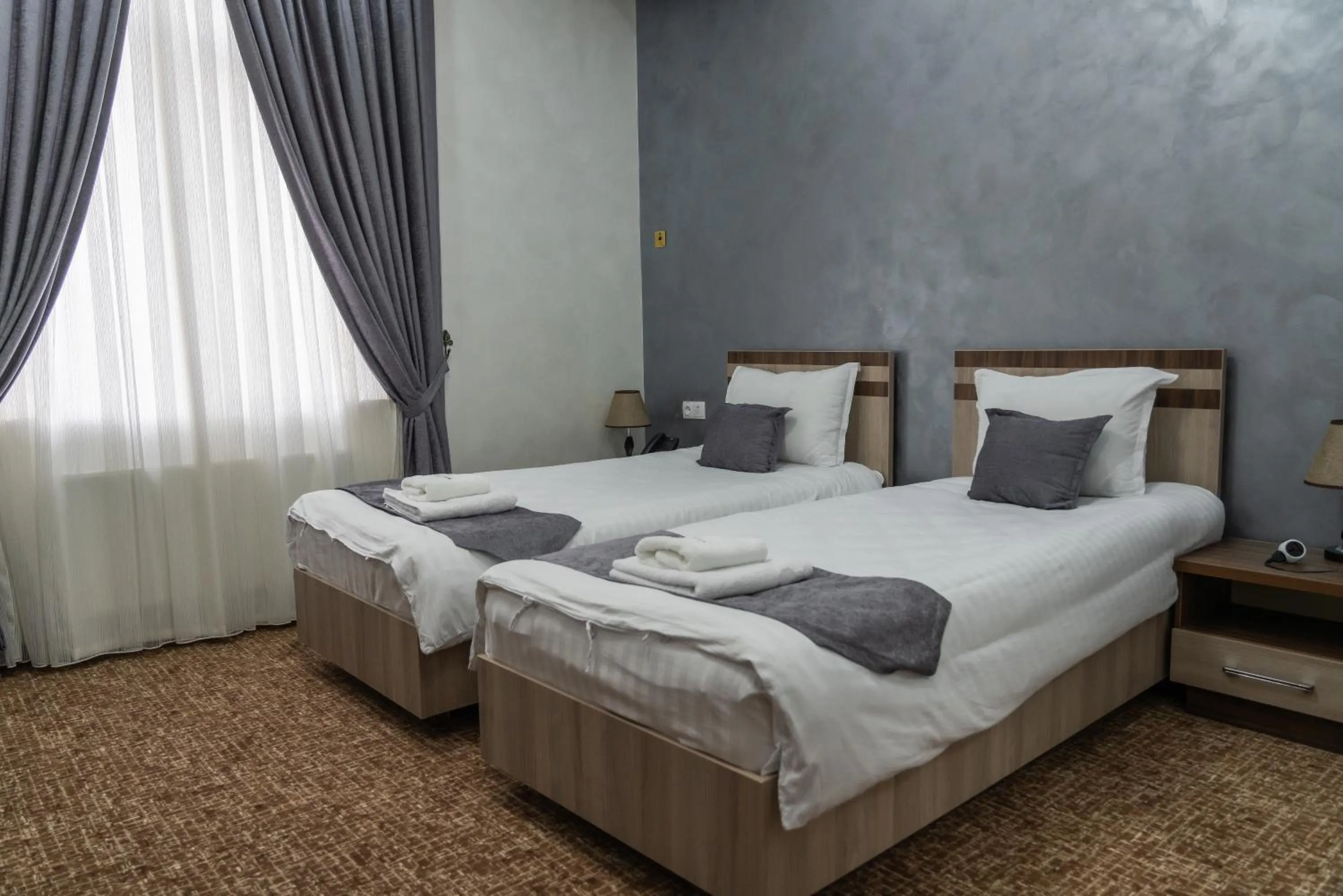 Photo of the whole room, Bed in Rayyan Hotel & SPA Tashkent