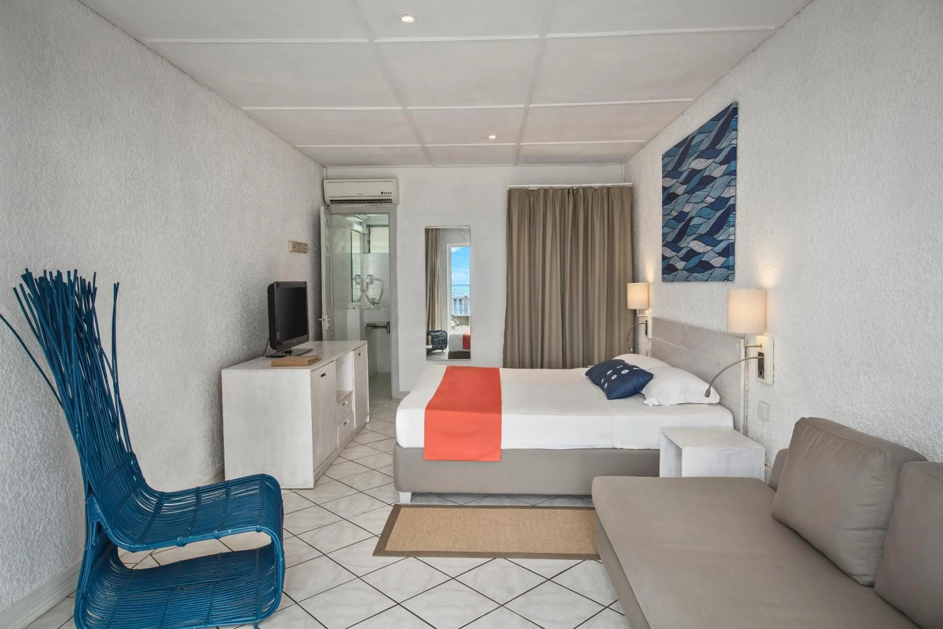 Bed in Astroea Beach Hotel