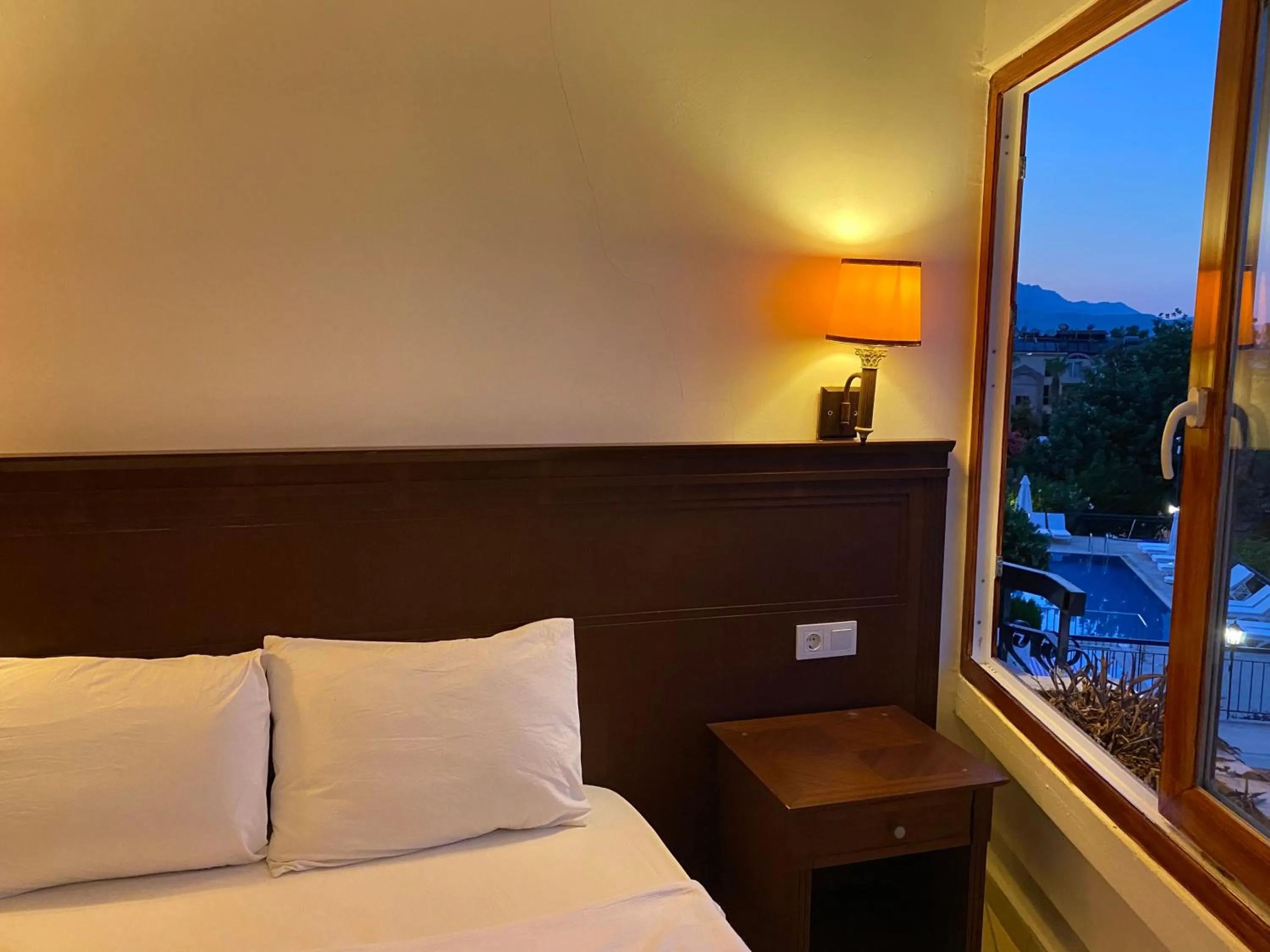 Bedroom in NATURELLA APART HOTEL