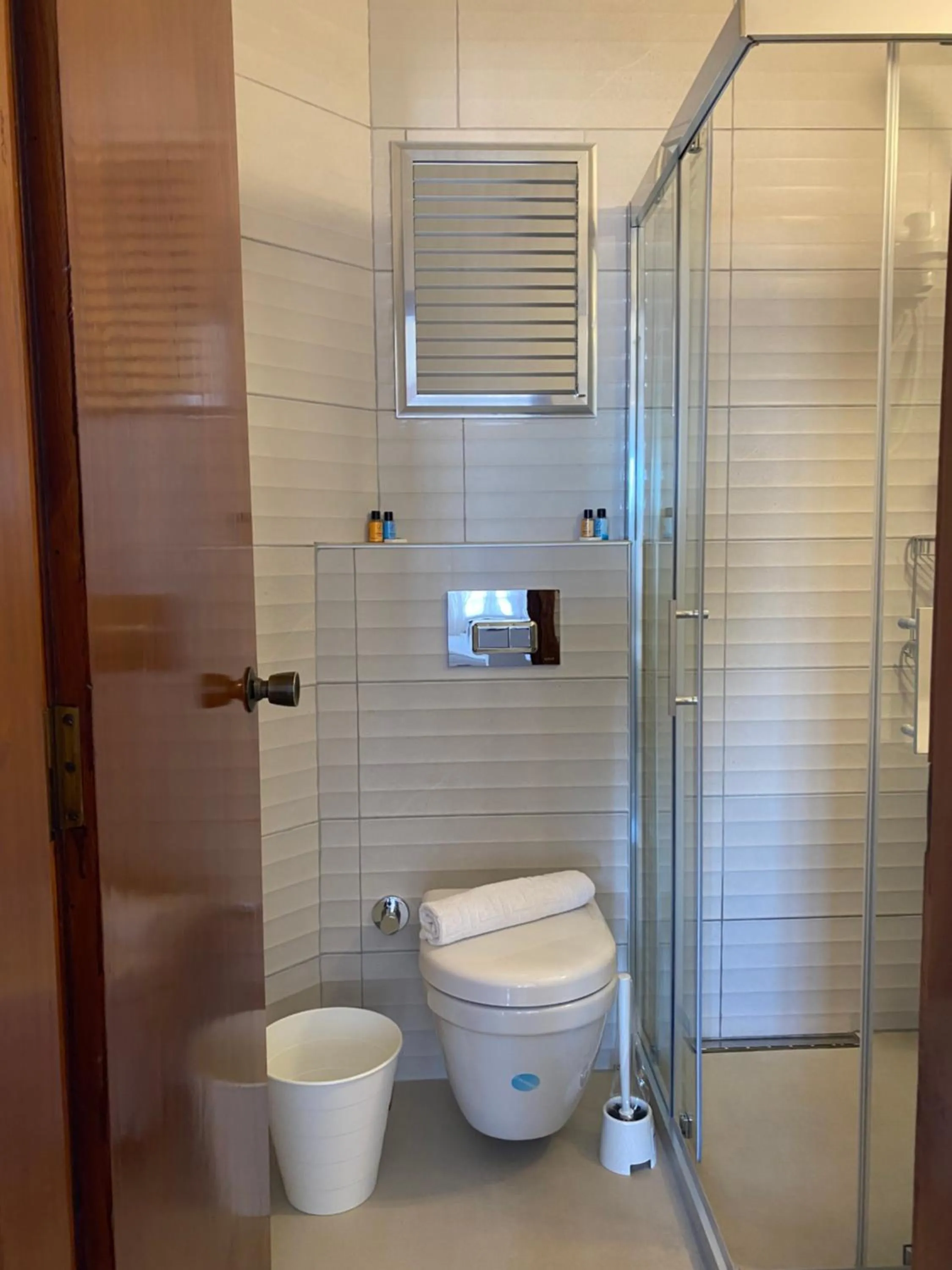 Shower in NATURELLA APART HOTEL