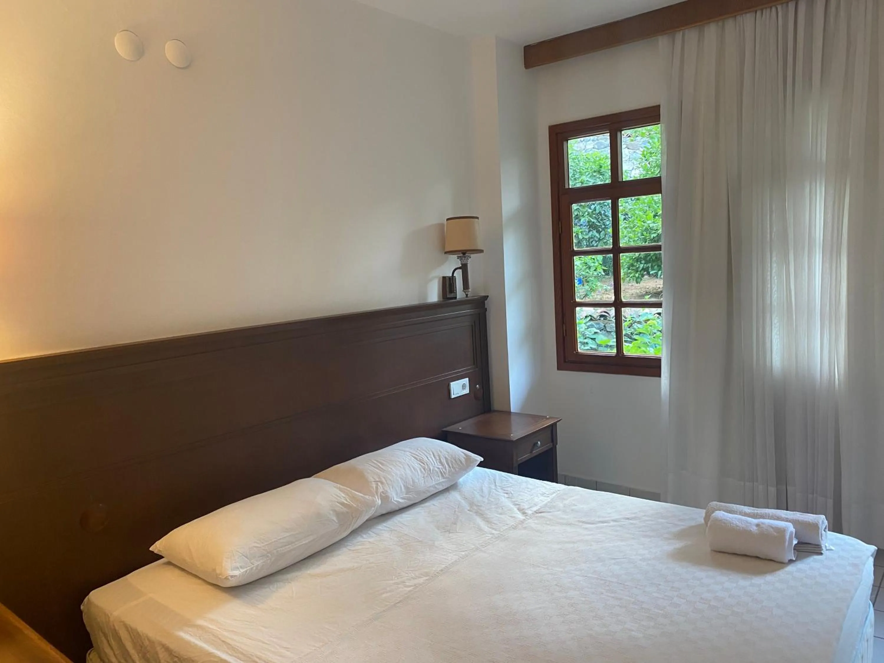 Bedroom in NATURELLA APART HOTEL