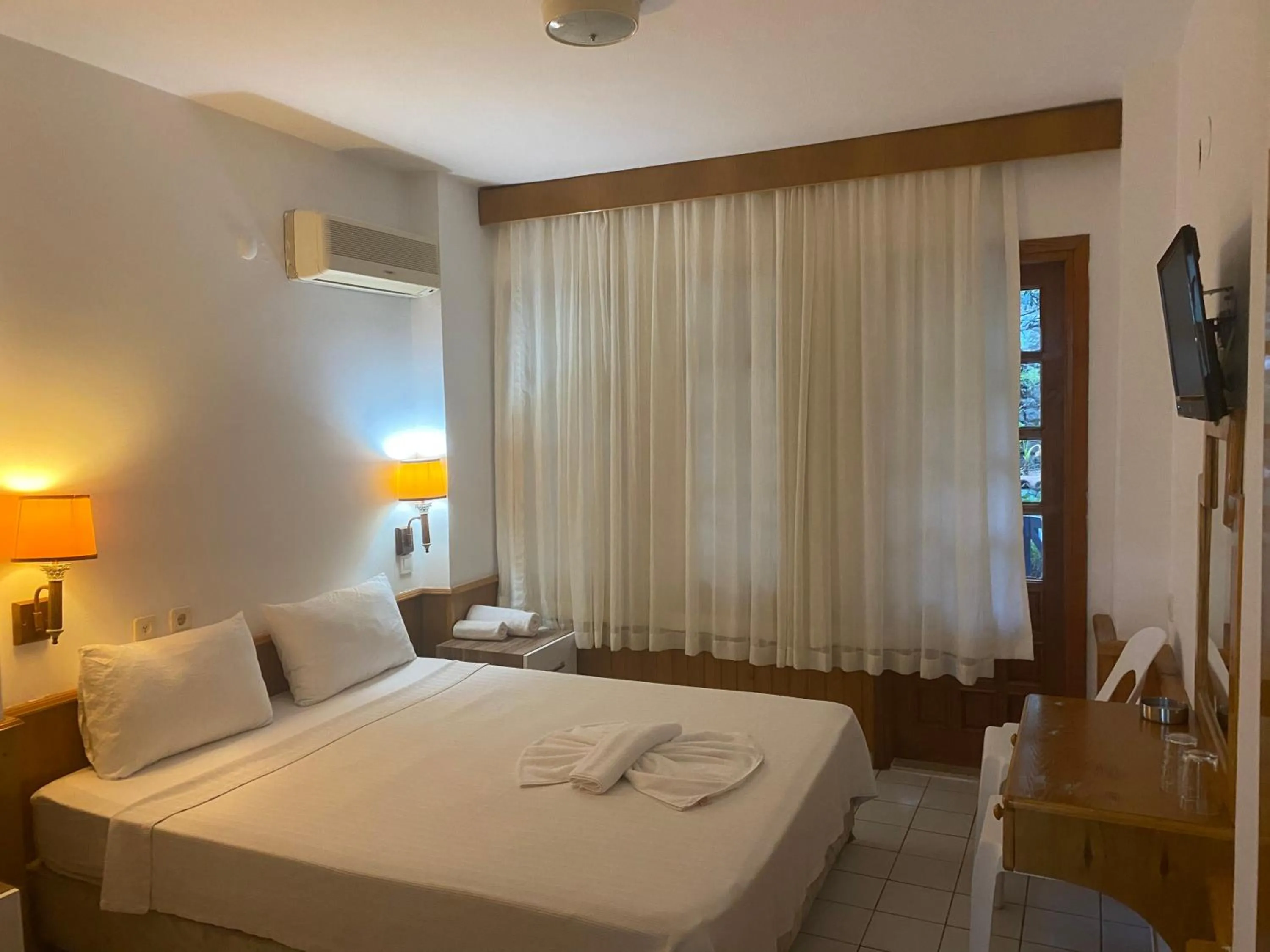 Bedroom in NATURELLA APART HOTEL