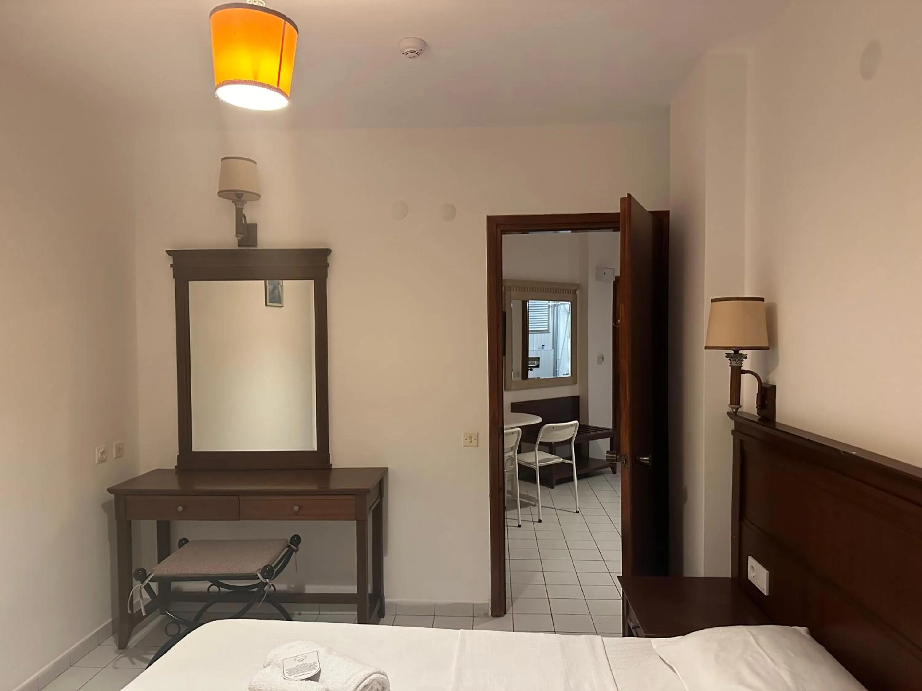 Bed in NATURELLA APART HOTEL