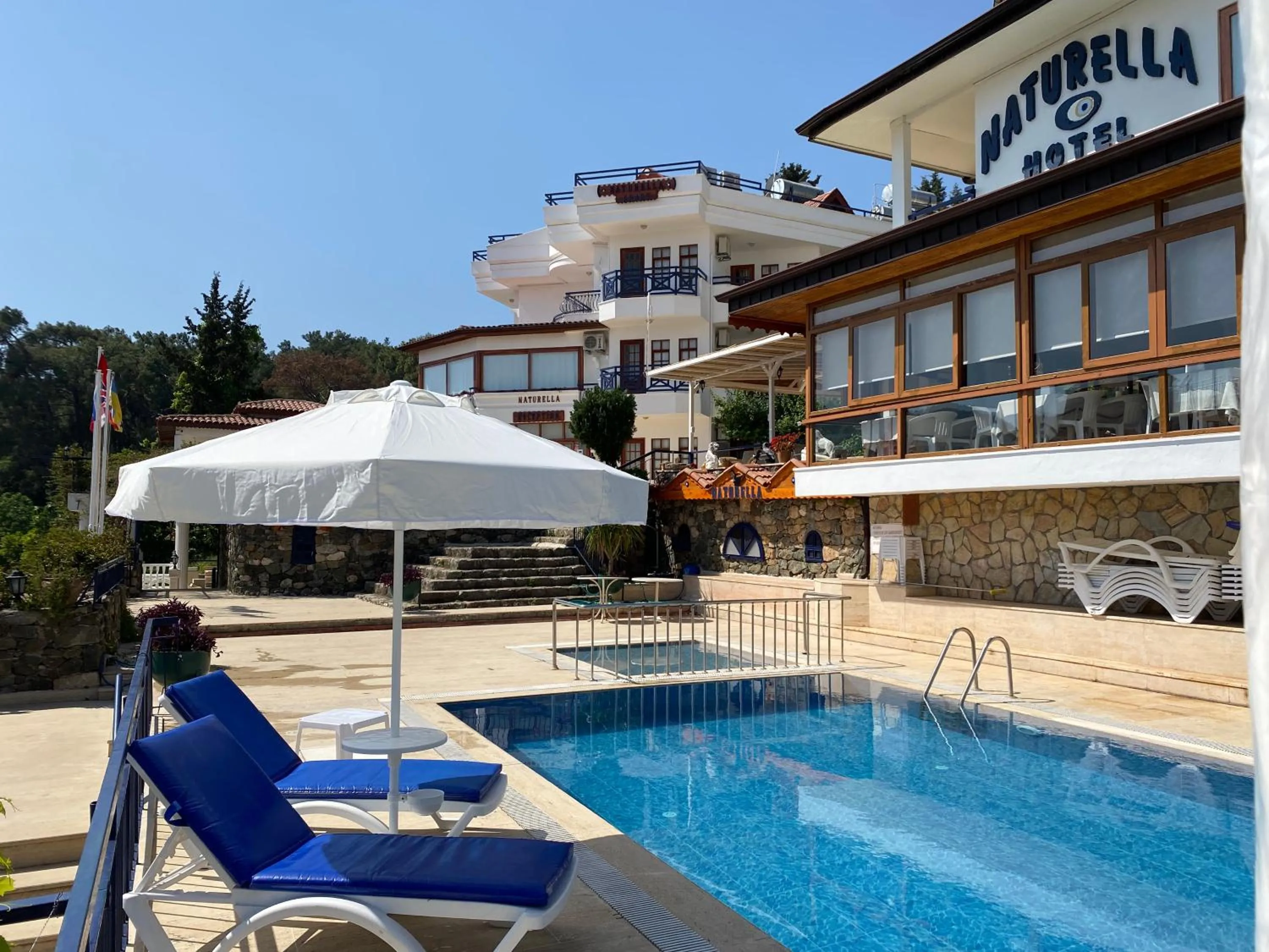 Swimming pool in NATURELLA APART HOTEL