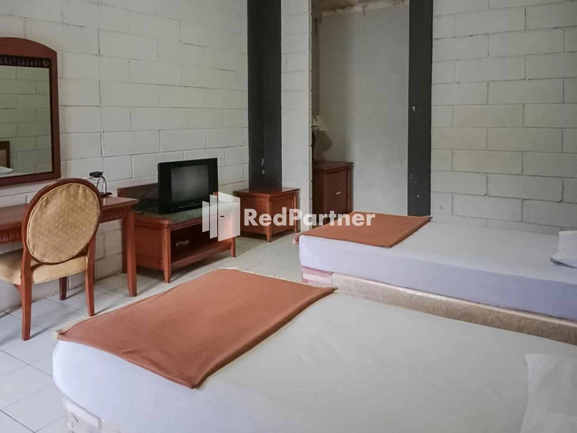 Bed in Kampung Resort Pertiwi RedPartner
