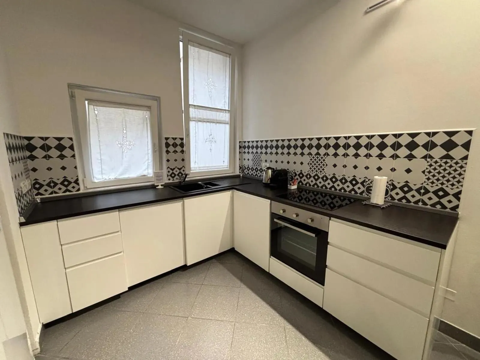 Kitchen or kitchenette in Phi Hotel Bologna