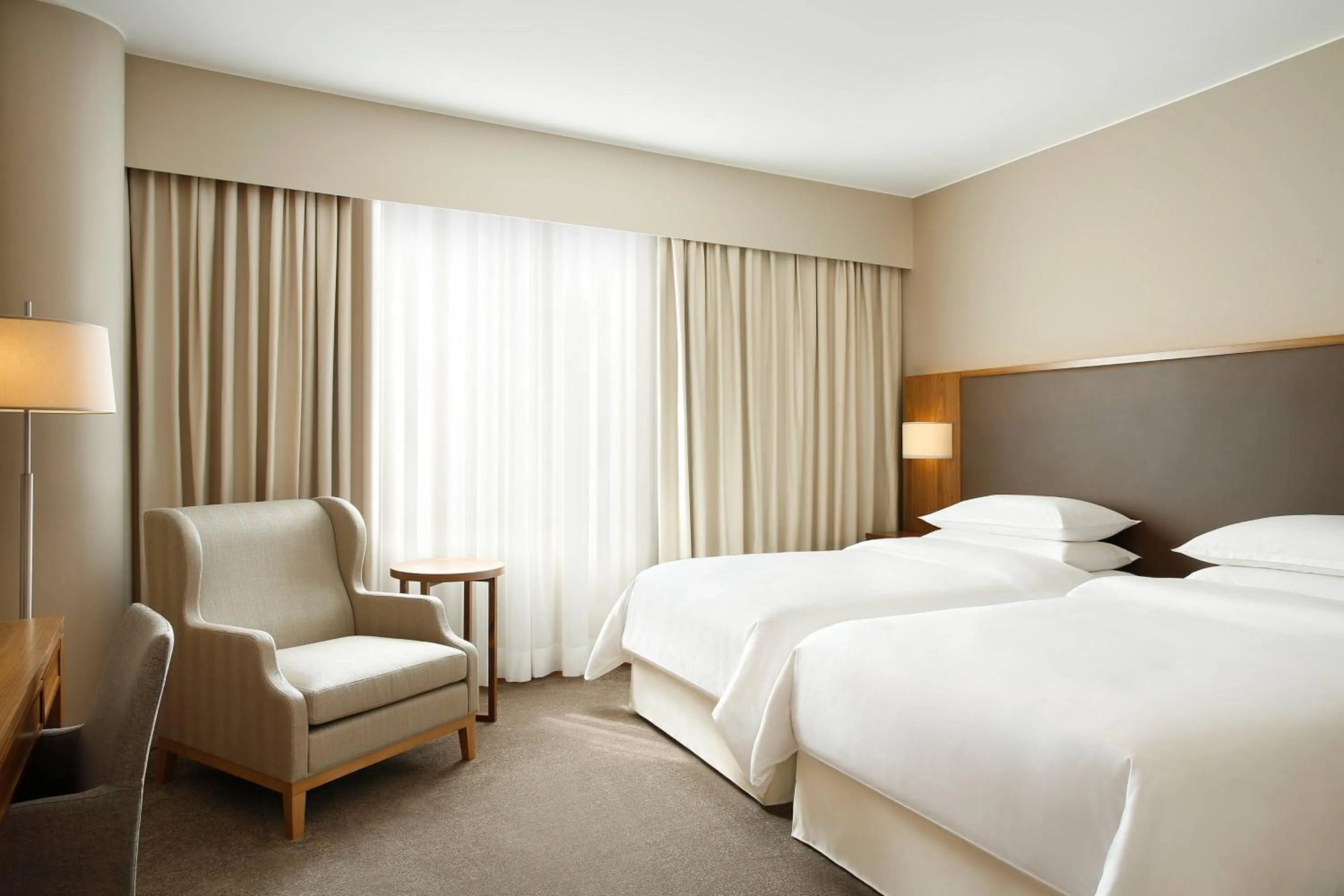 Photo of the whole room, Bed in Sheraton Lake Como Hotel