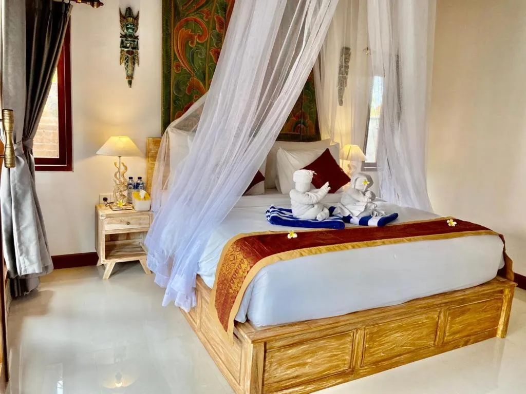 Bed in Sridewi Villas Ubud