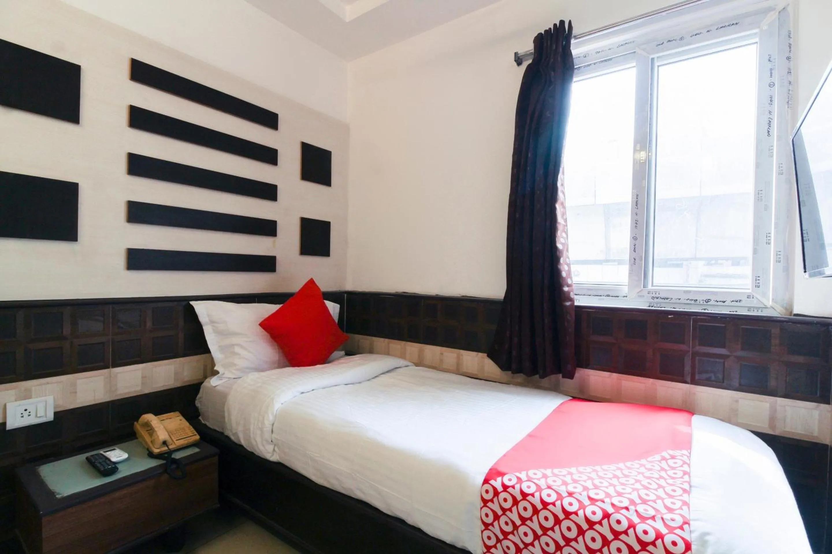 Bedroom, Bed in Hotel O by OYO V Square