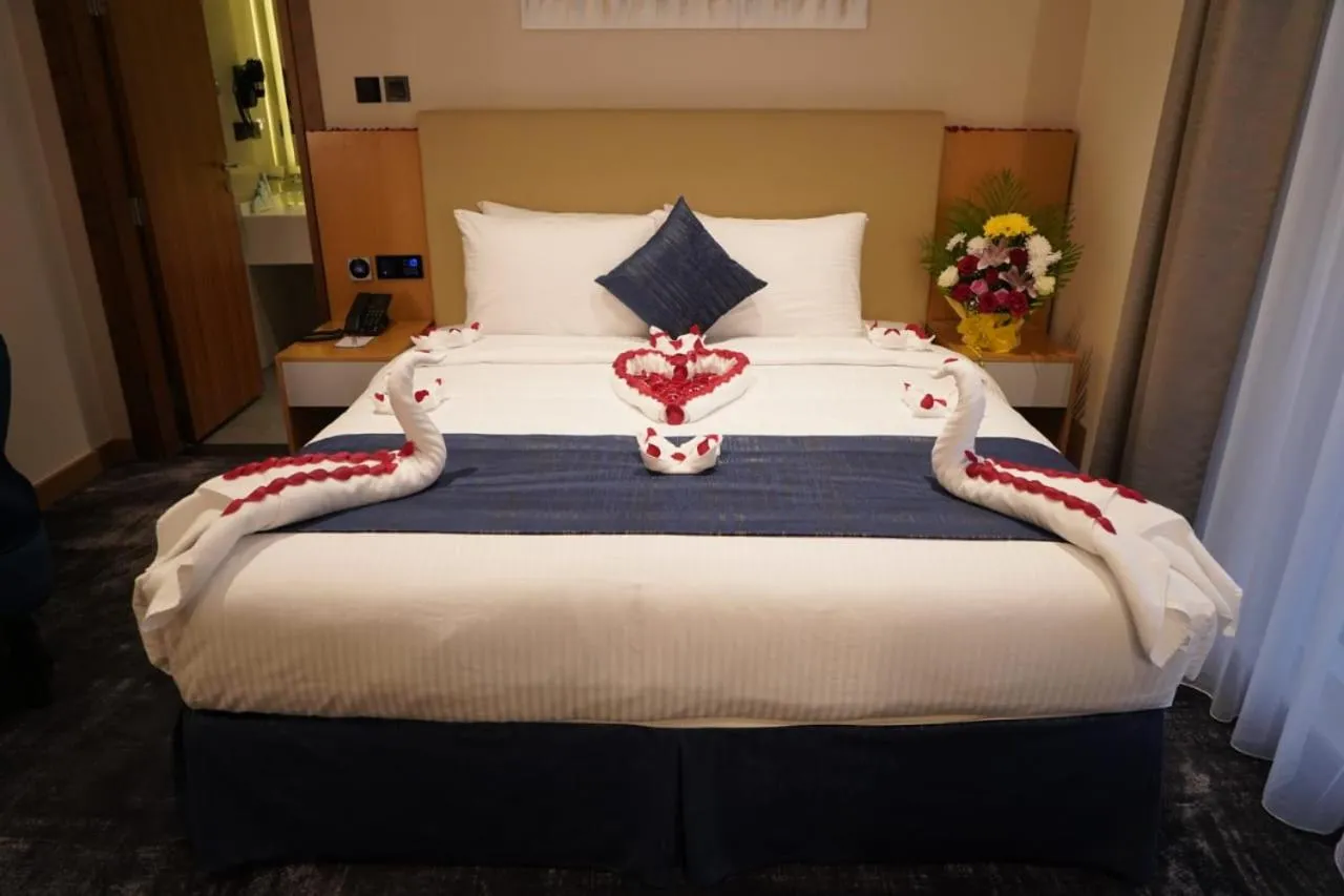 Bed in AL HAYAT HOTEL