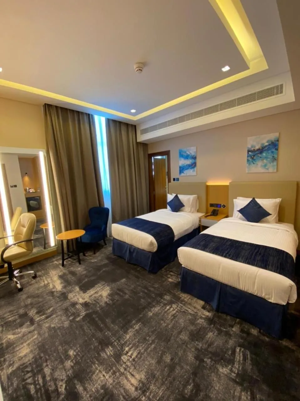 Bed in AL HAYAT HOTEL