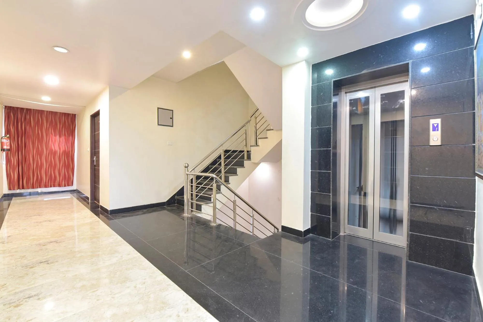 elevator in FabHotel Pink City - World Trade Park