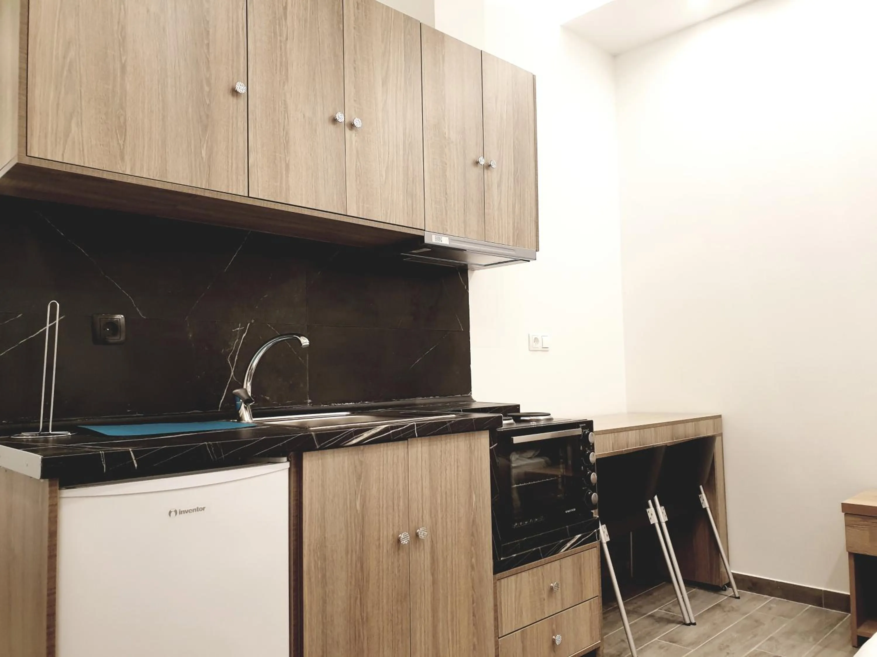 kitchen in Eantos Studios and Suites