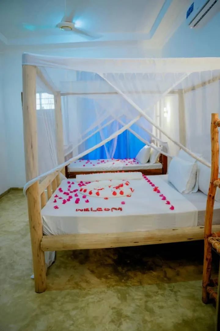 Bed in Serenity Boutique Hotel, Tanzania Unforgettable