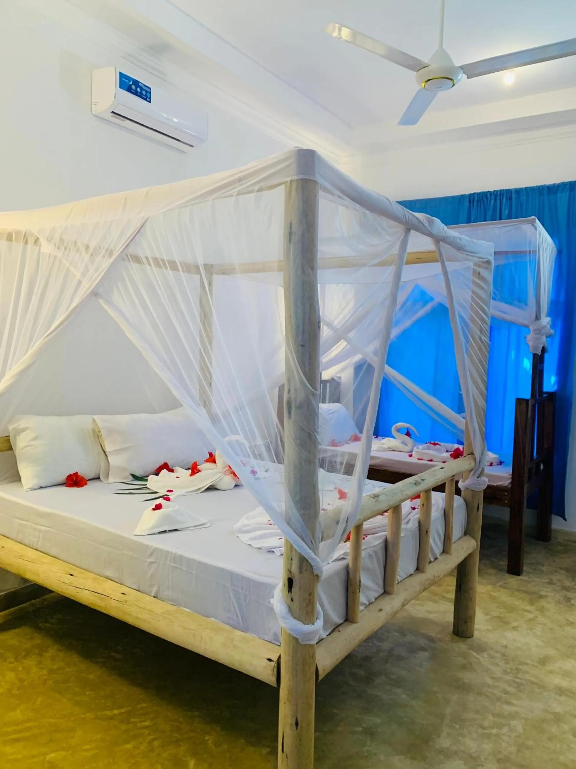 Bed in Serenity Boutique Hotel, Tanzania Unforgettable