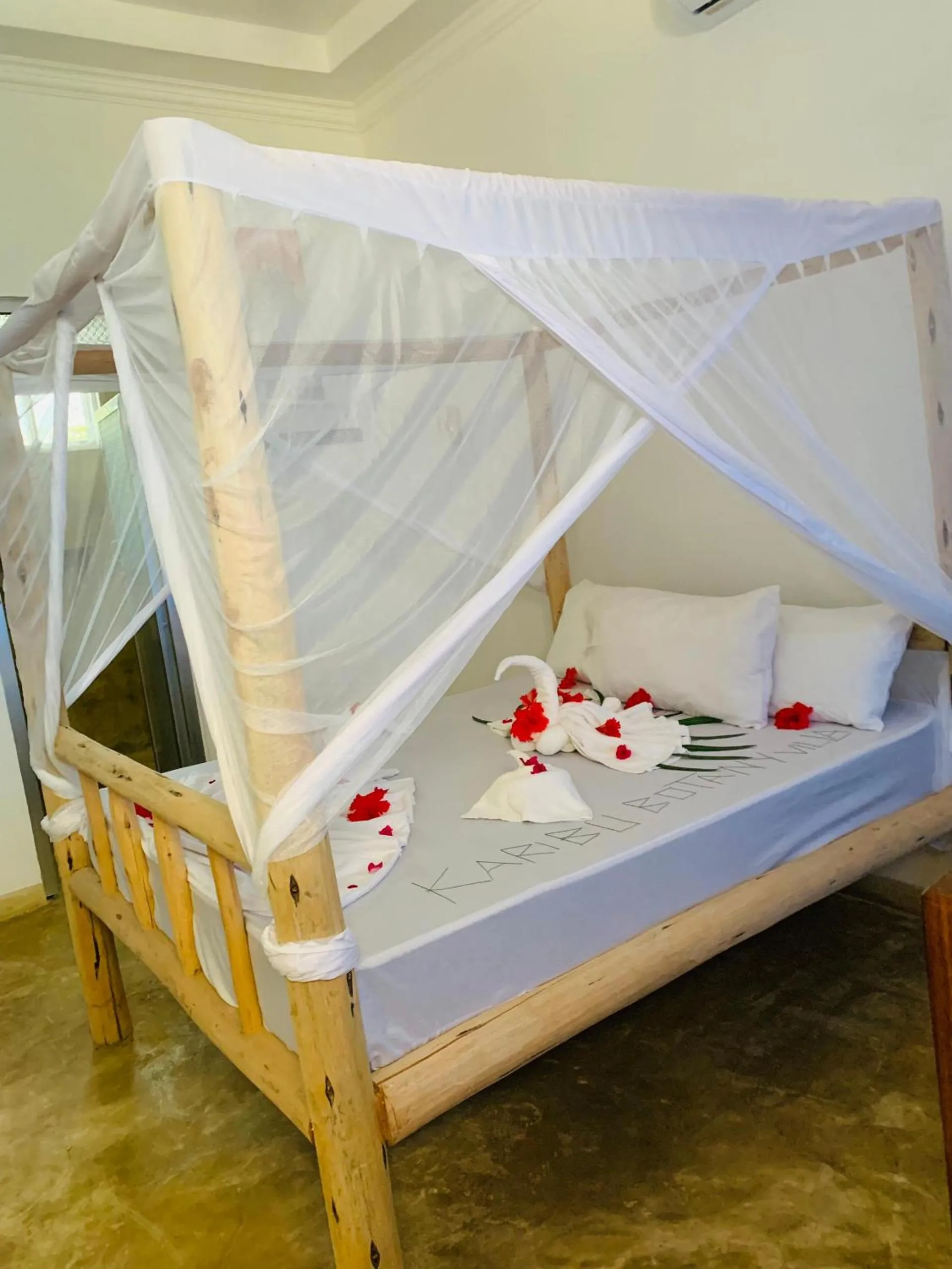 Bed in Serenity Boutique Hotel, Tanzania Unforgettable