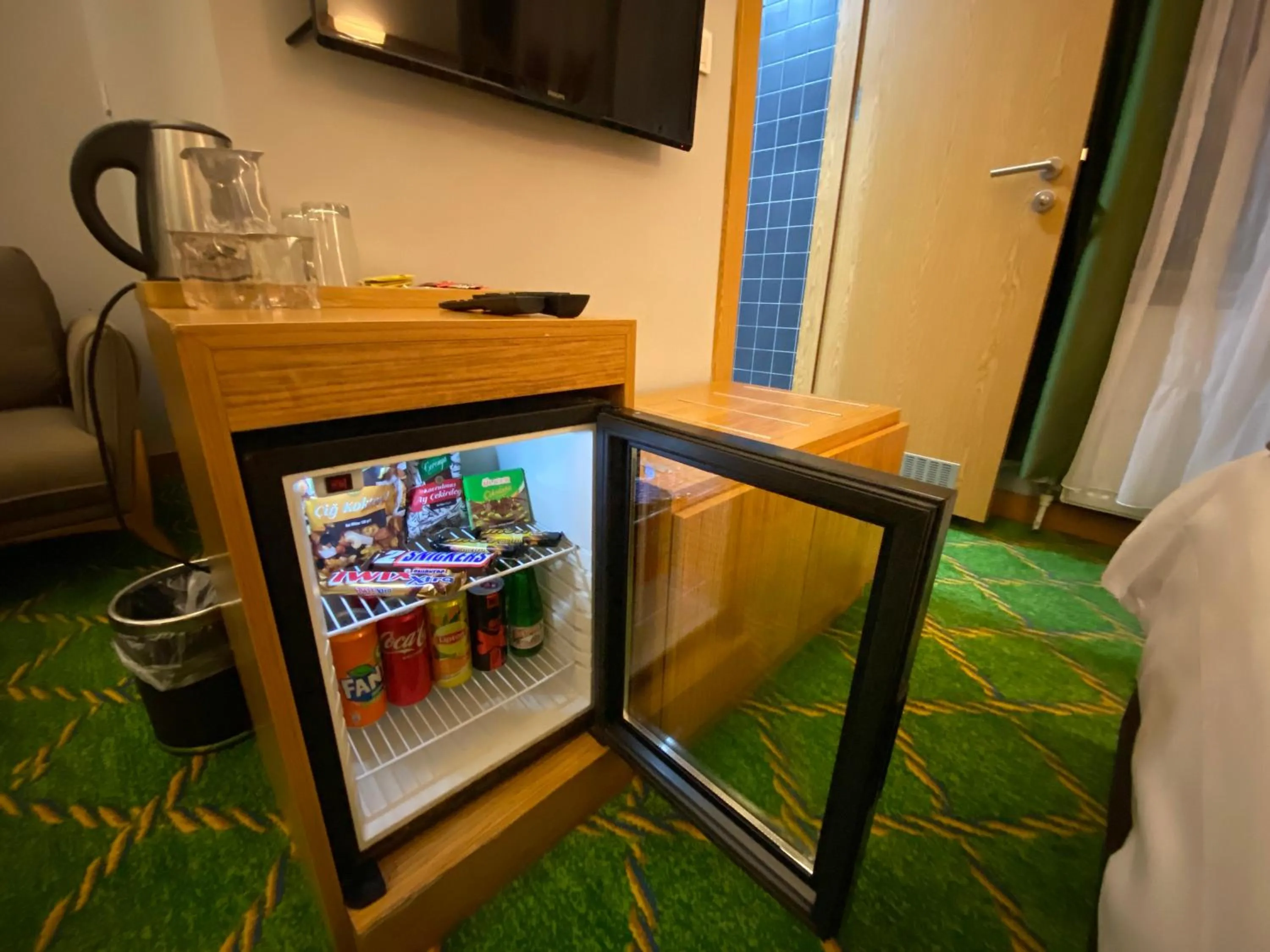 Communal lounge/ TV room, Bed in Won Plaza