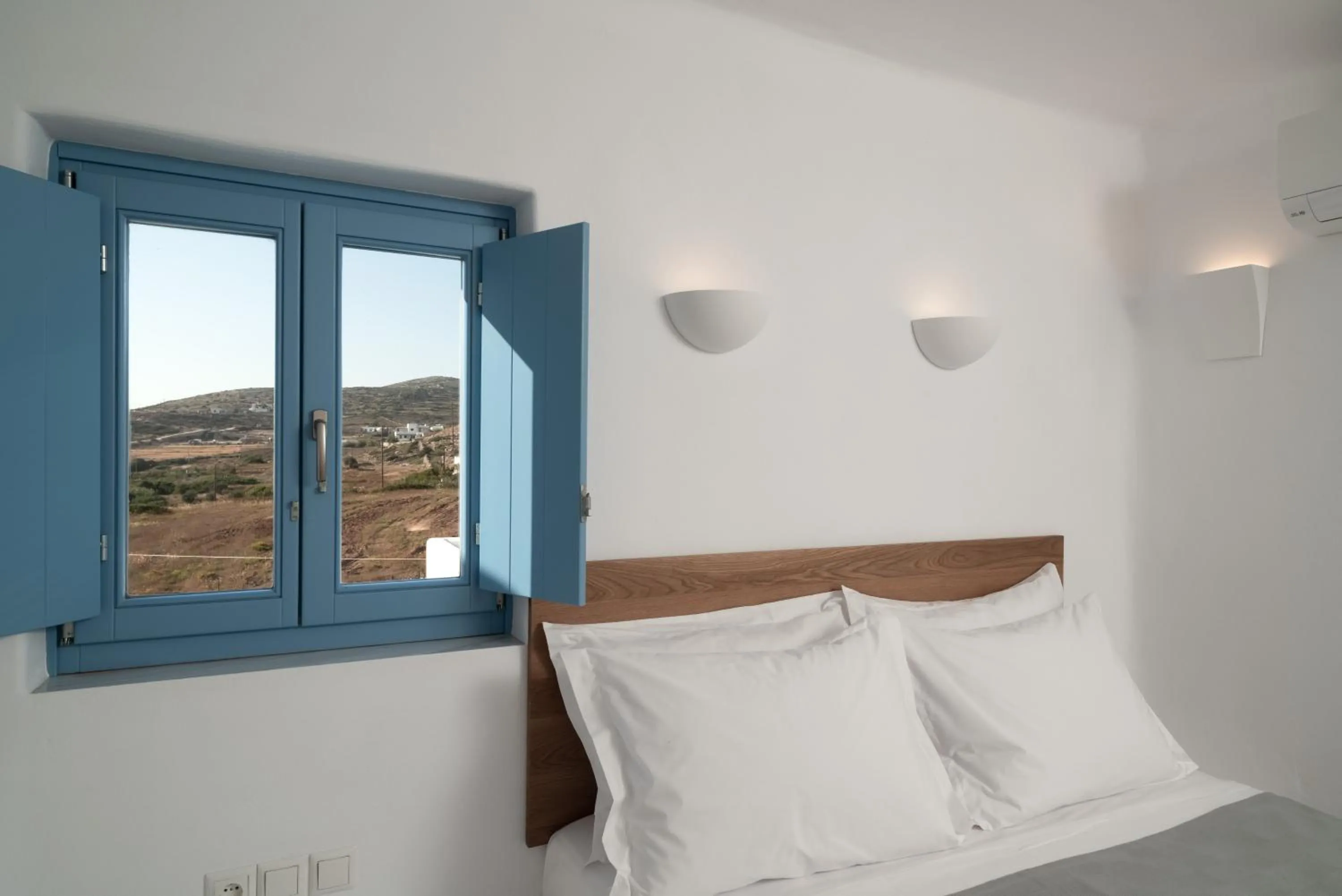 Bed in Camvillia Donoussa Village Suites