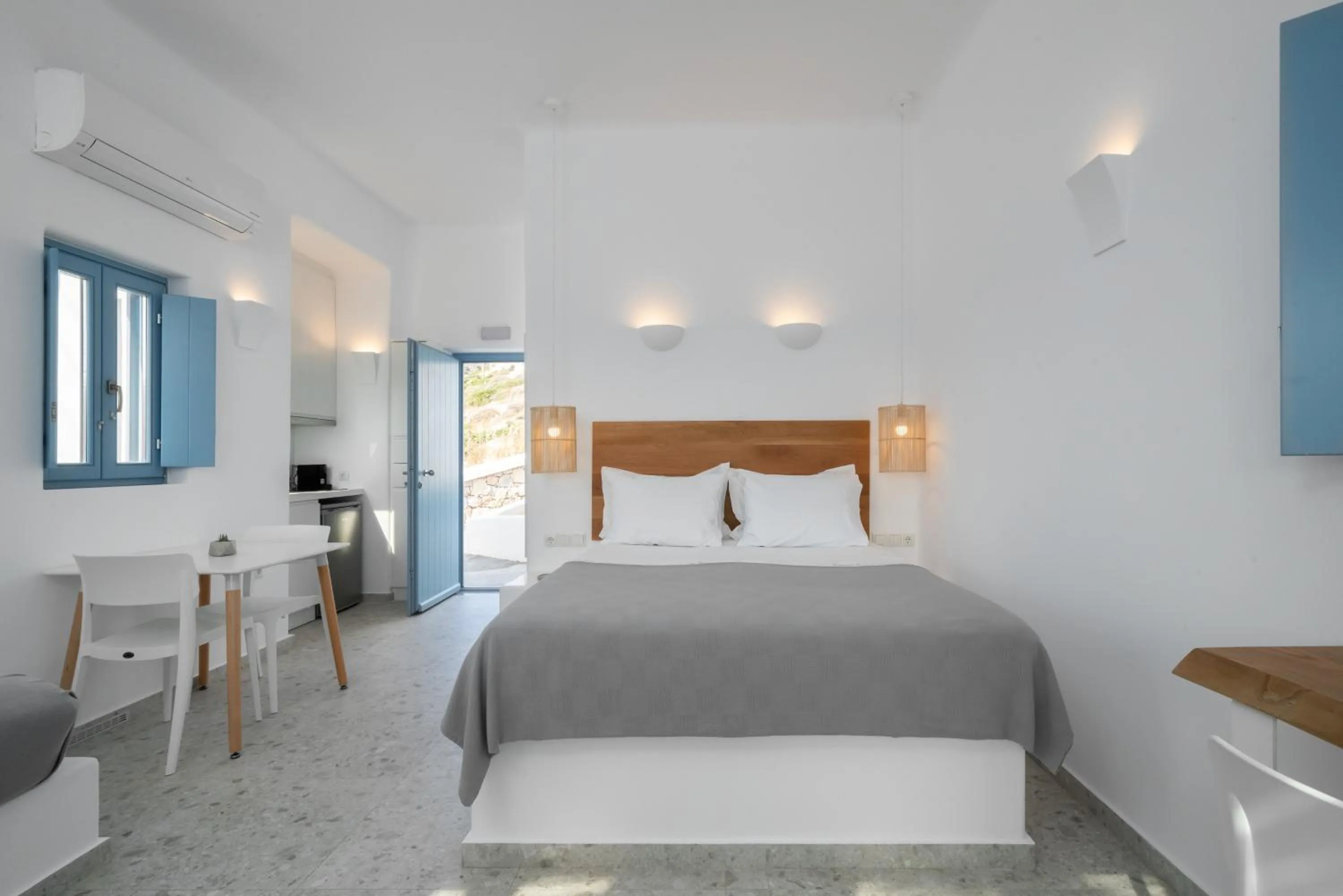 Bed in Camvillia Donoussa Village Suites