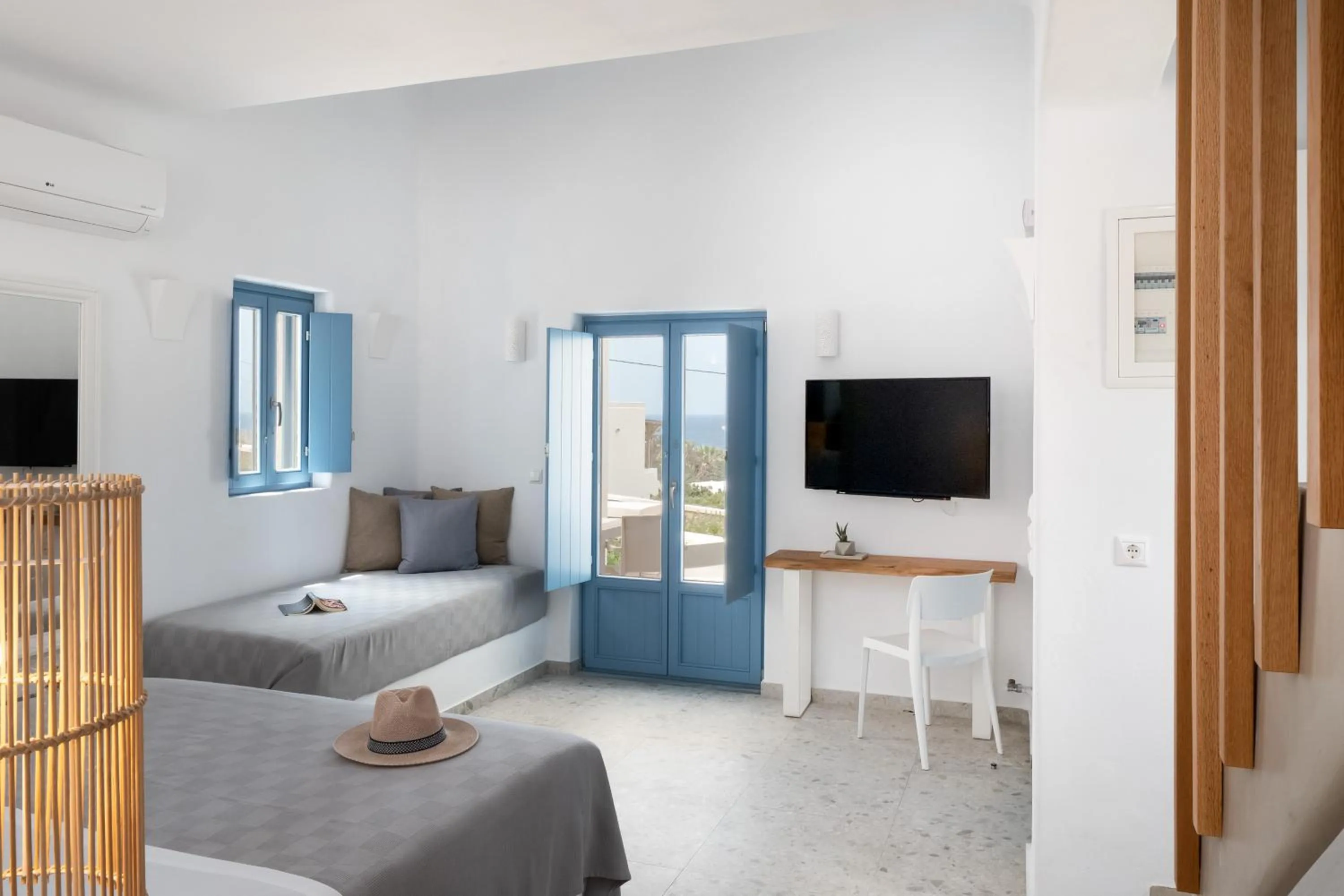 Bed in Camvillia Donoussa Village Suites