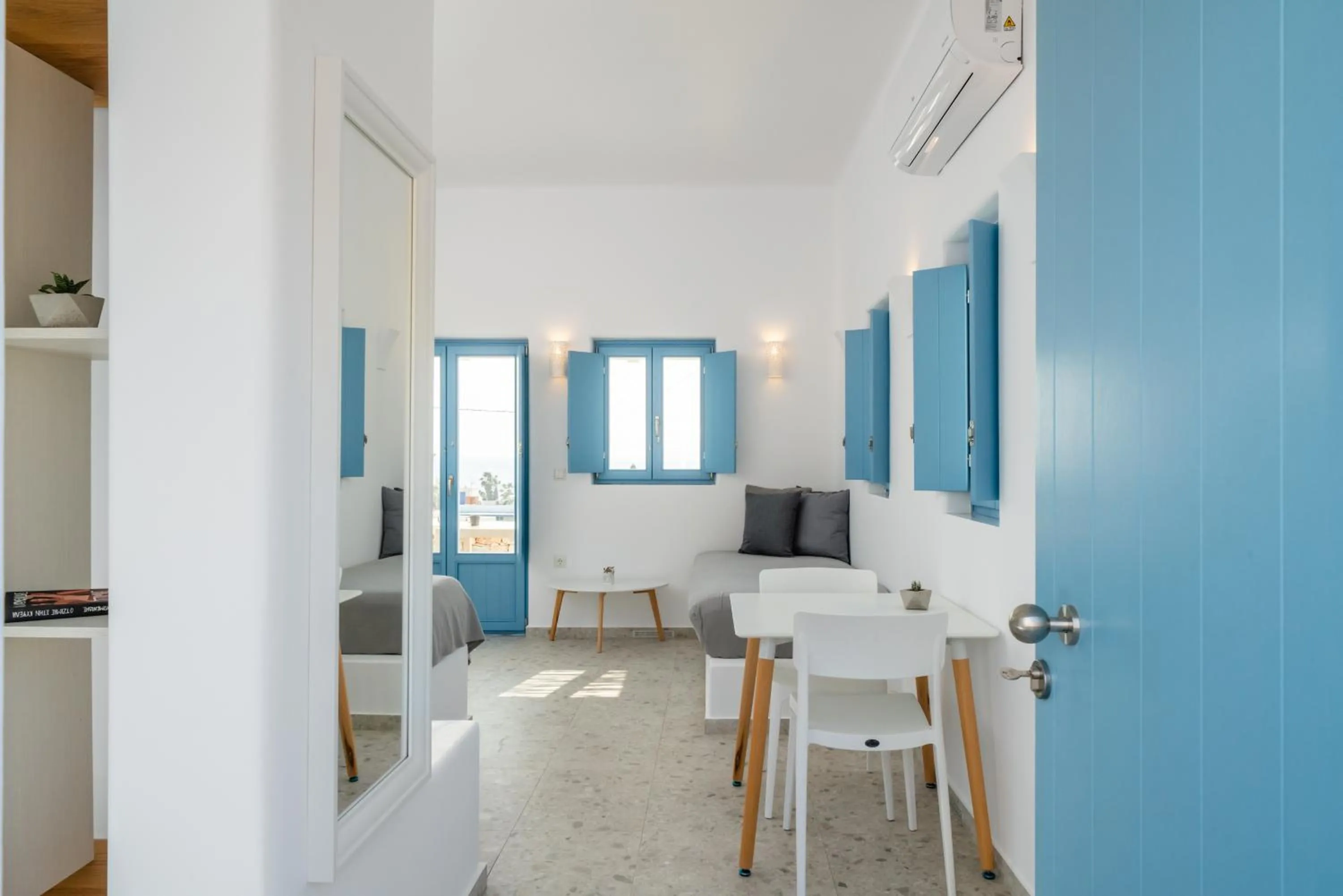 Seating area, Bed in Camvillia Donoussa Village Suites