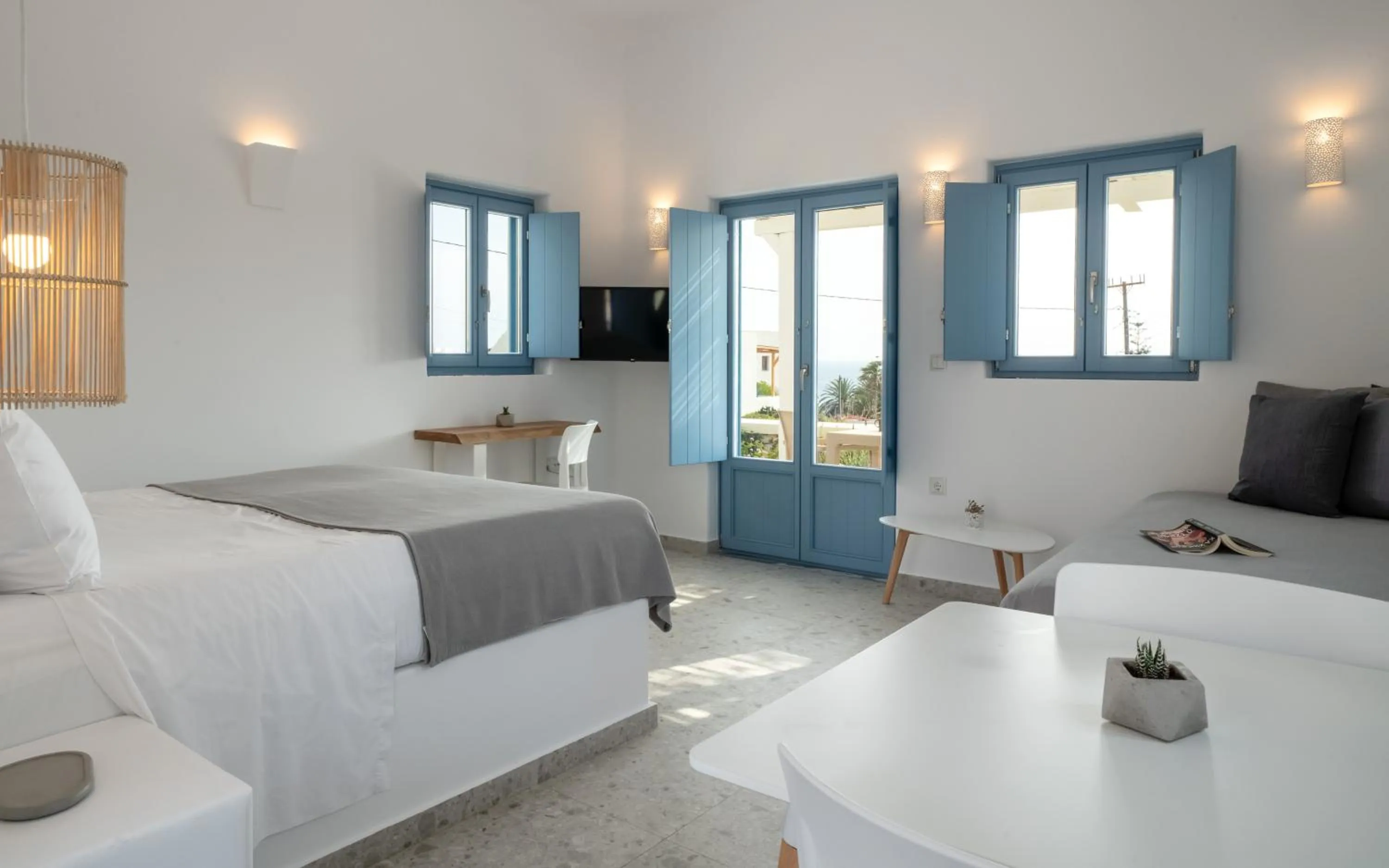 Bed in Camvillia Donoussa Village Suites