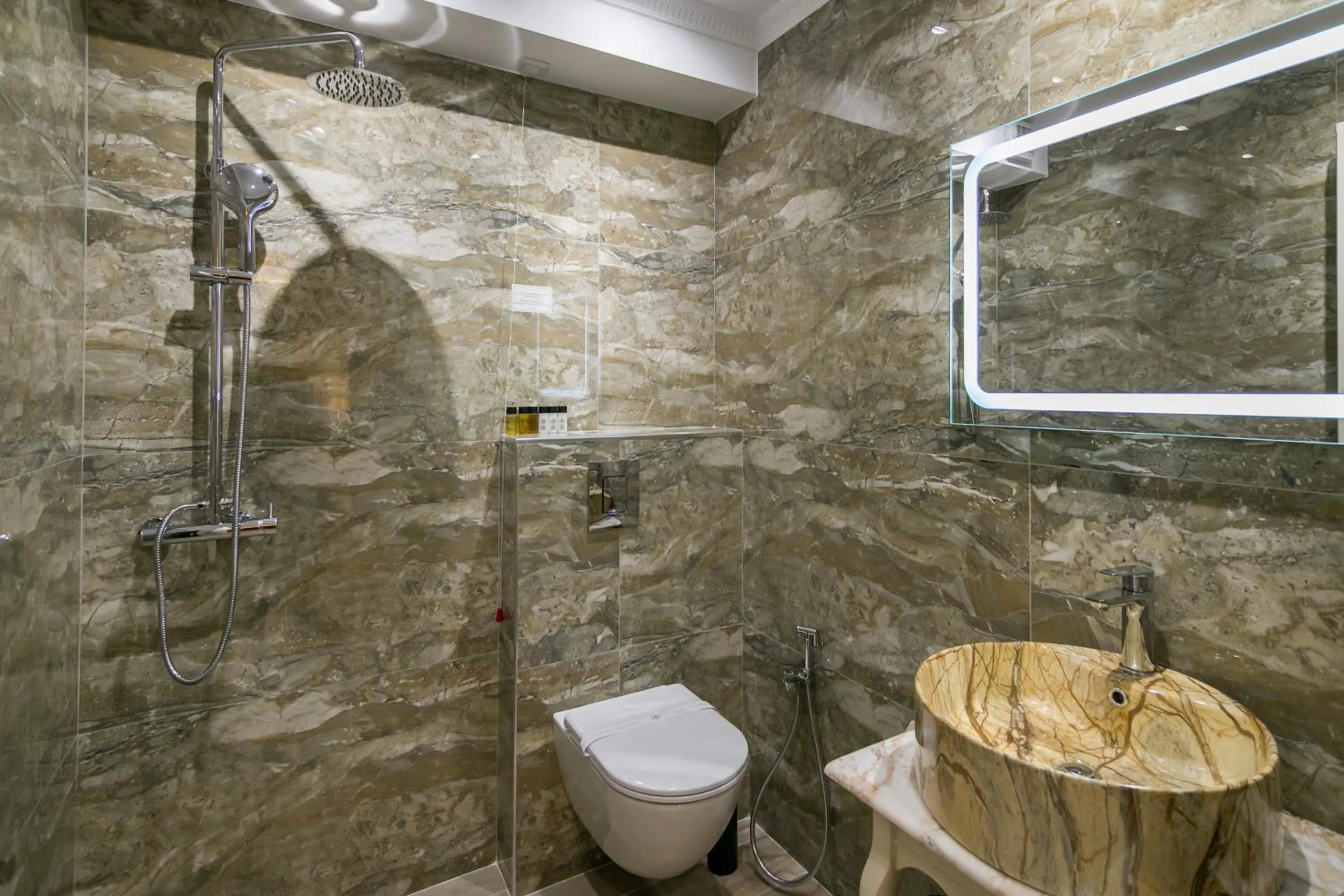 Toilet in Legacy Boutique Hotel