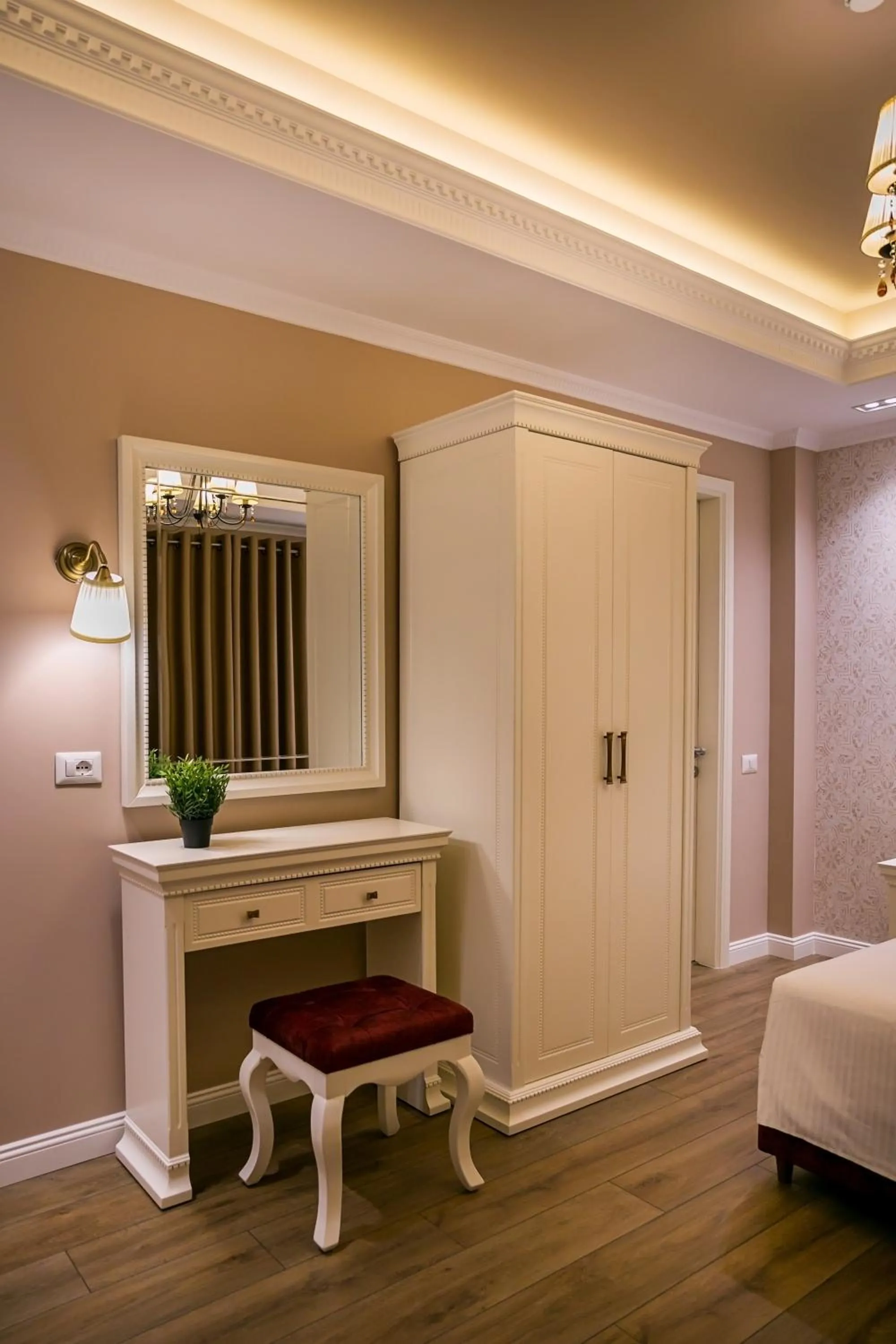 Seating area, Bed in Legacy Boutique Hotel