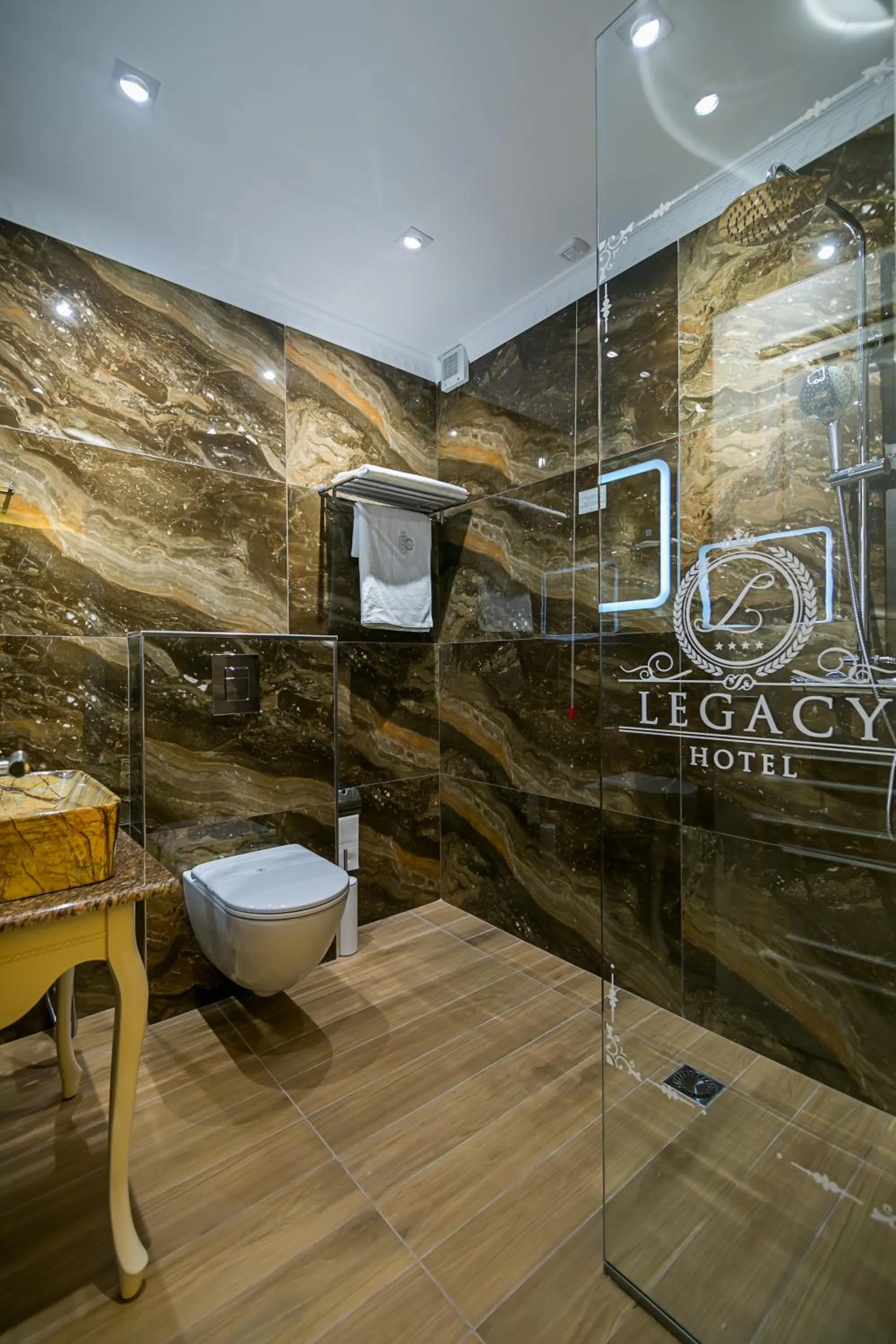 Toilet in Legacy Boutique Hotel