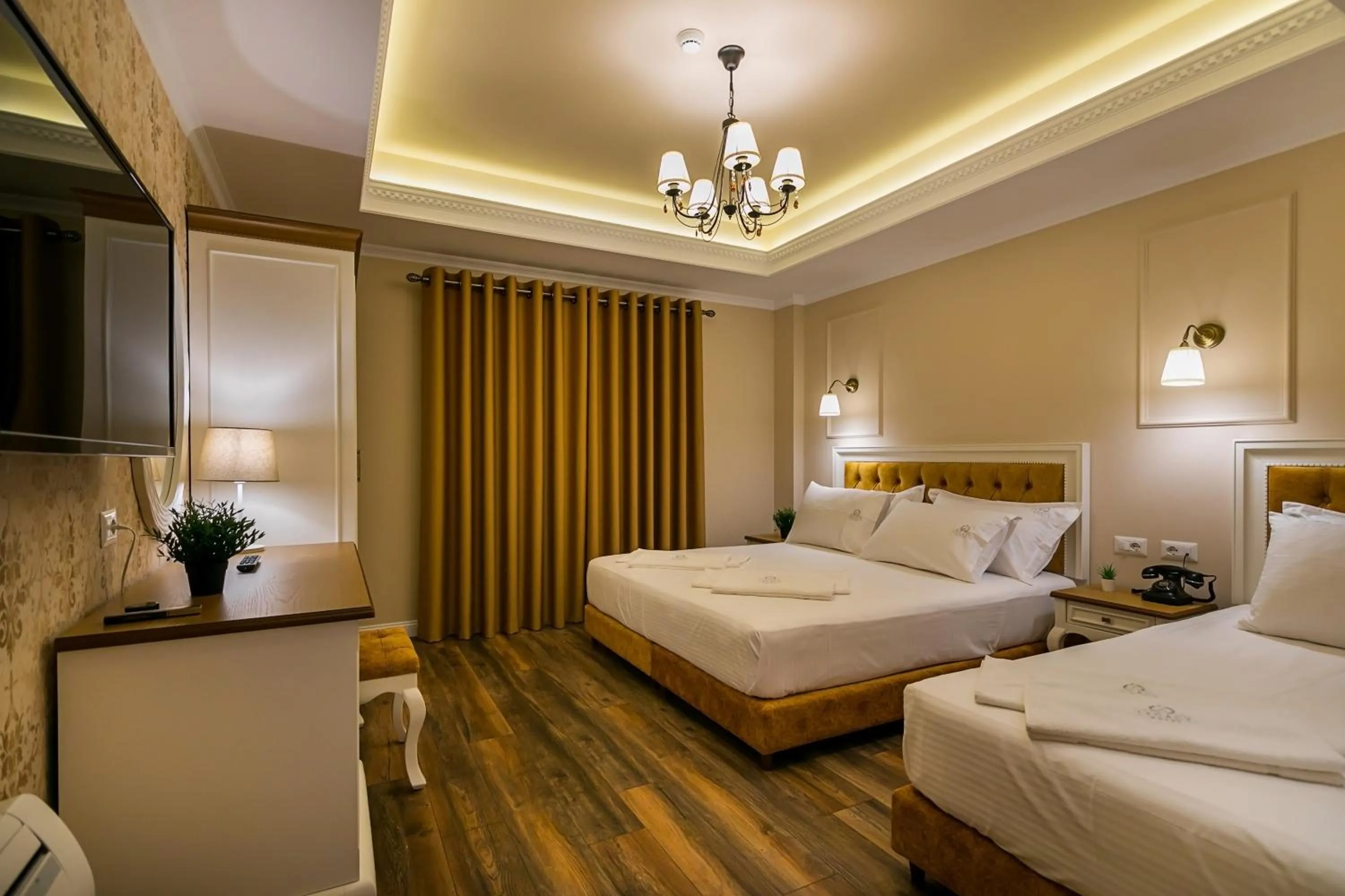 Bed in Legacy Boutique Hotel