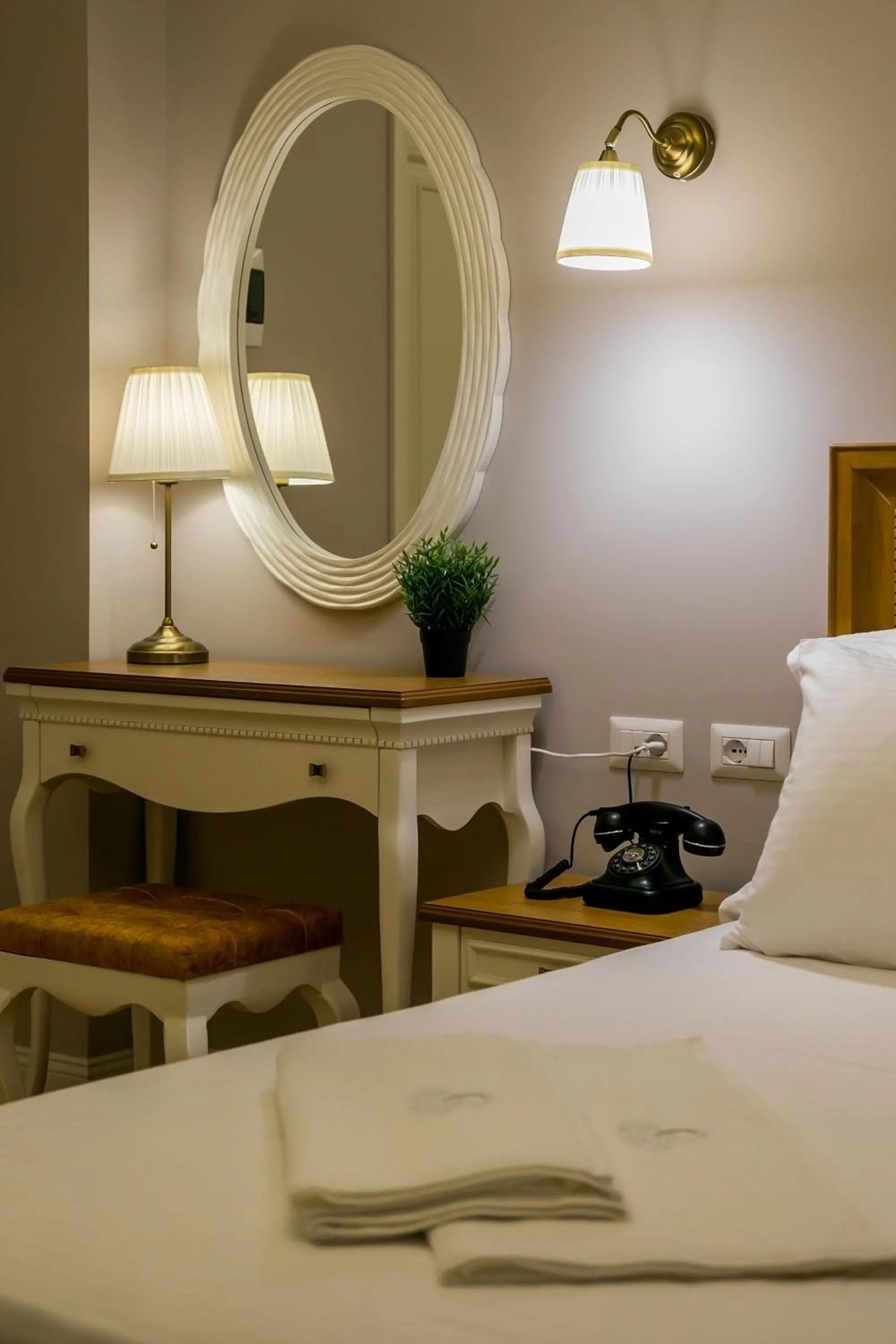 Bed in Legacy Boutique Hotel