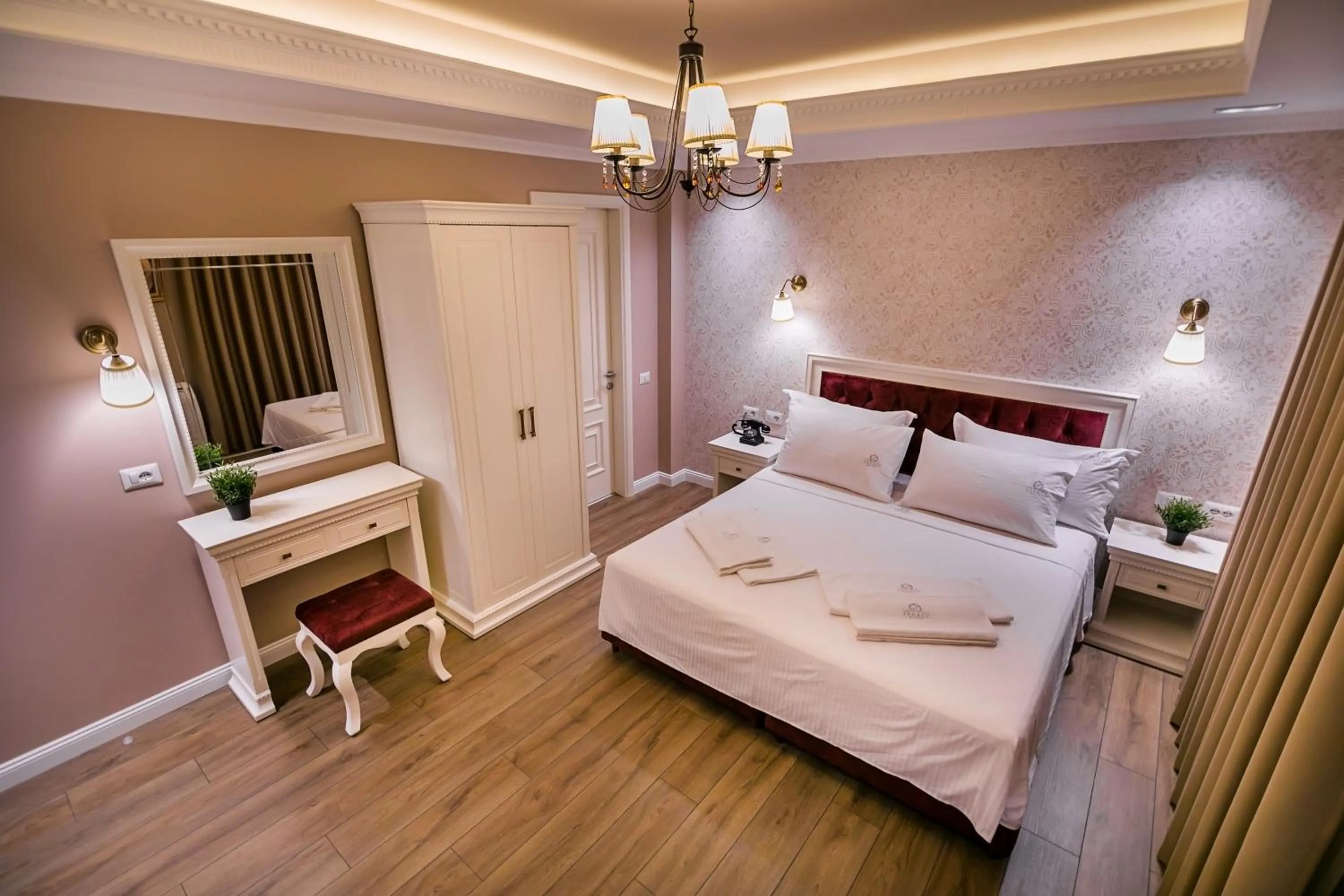 Bed in Legacy Boutique Hotel