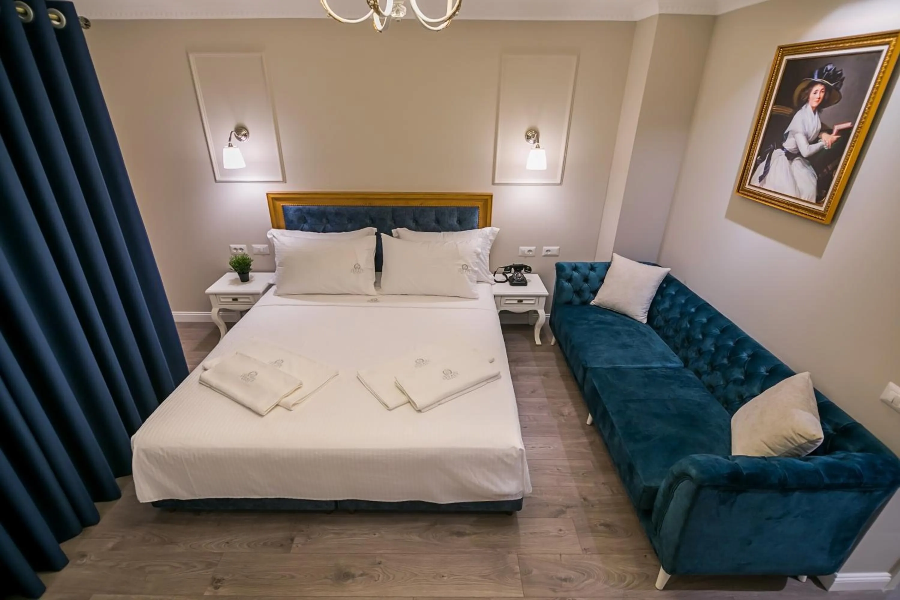 Bed in Legacy Boutique Hotel