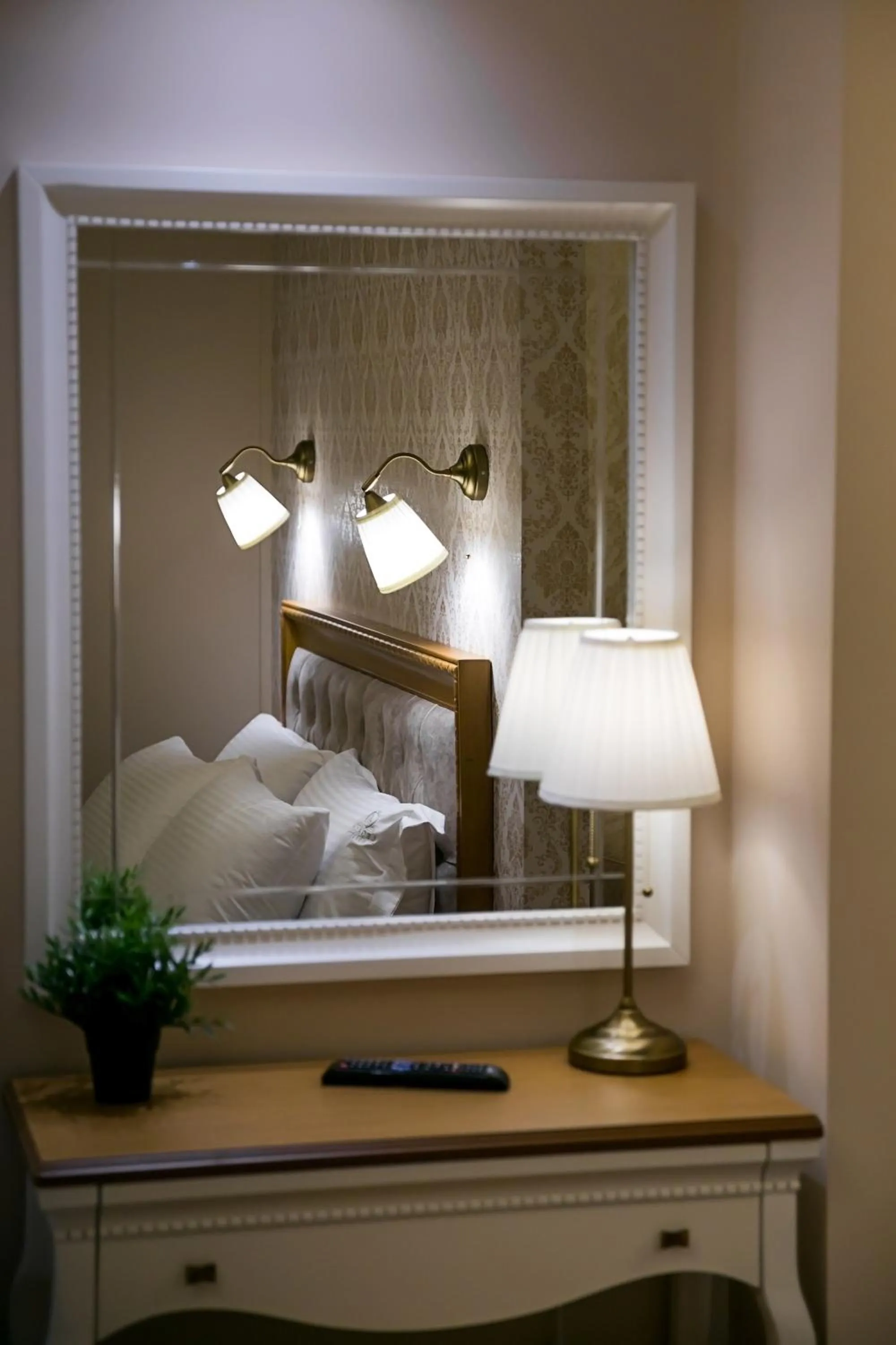 Bed in Legacy Boutique Hotel