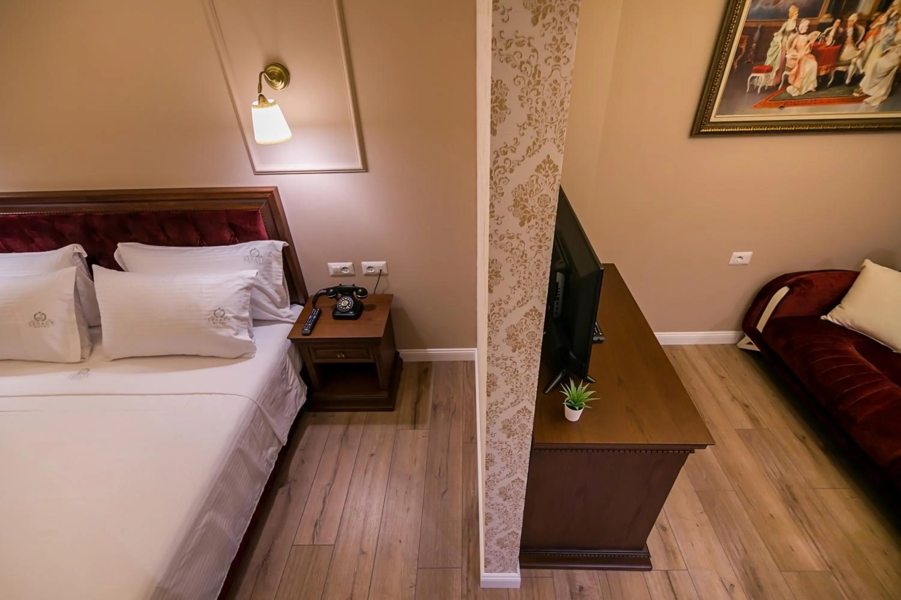 Bed in Legacy Boutique Hotel