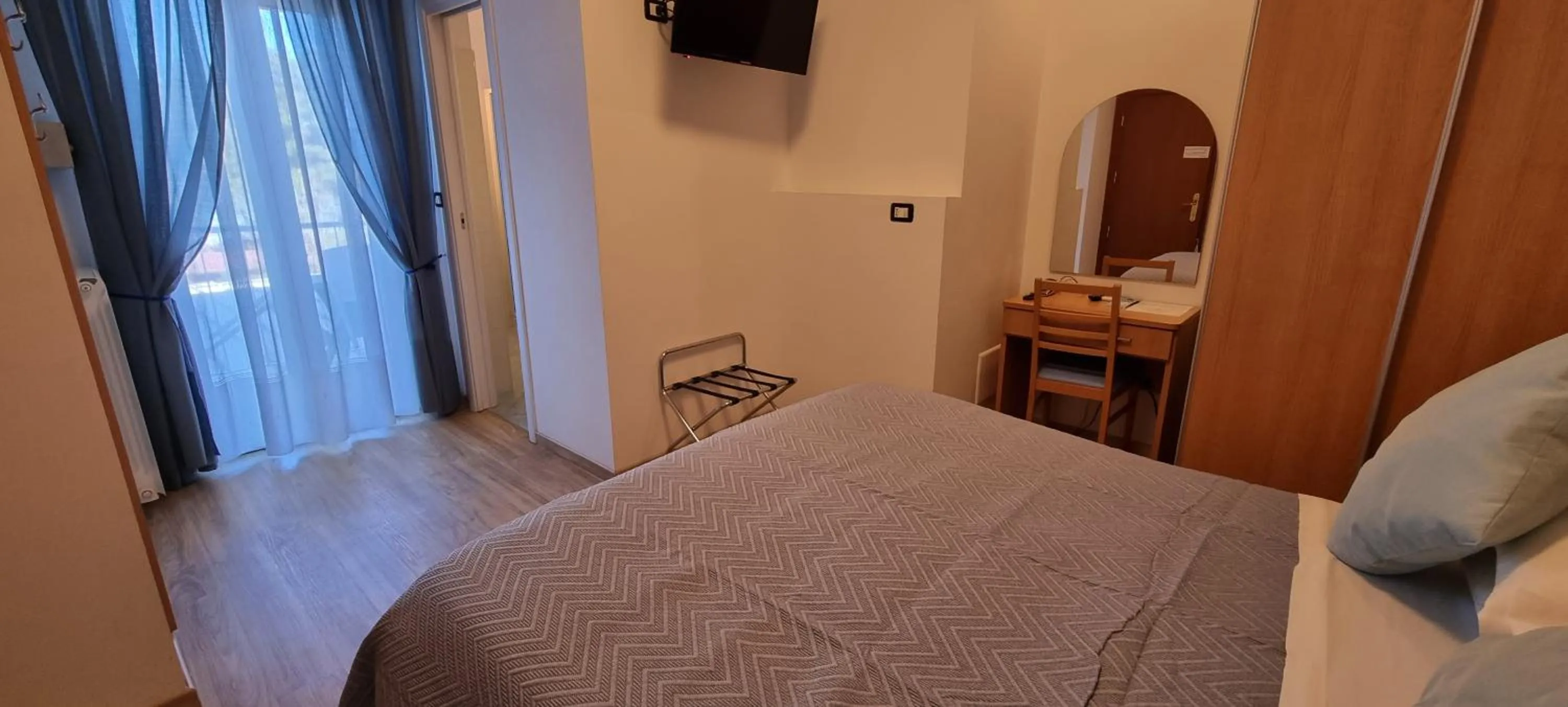 Bed in Hotel Mare Blu -- boutique