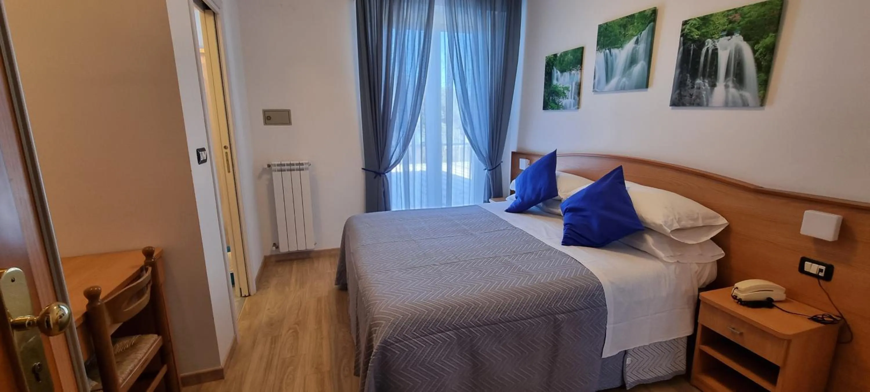 Bed in Hotel Mare Blu -- boutique