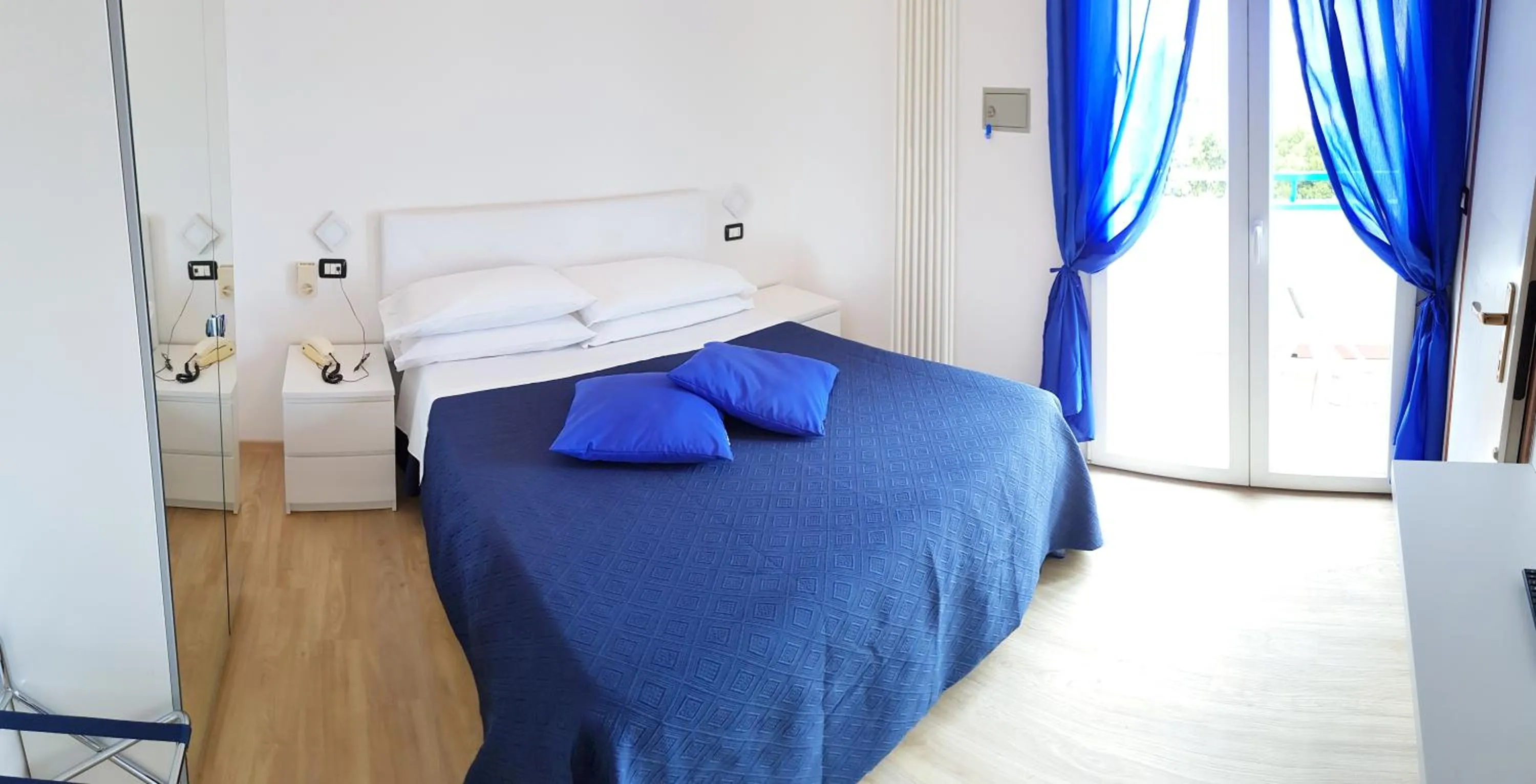 Bed in Hotel Mare Blu -- boutique