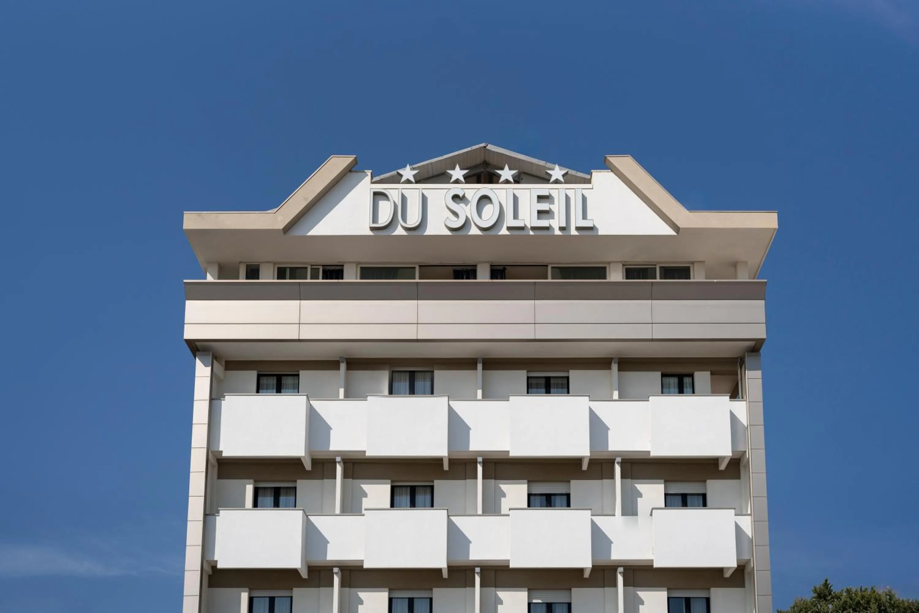 Property building in Hotel Du Soleil
