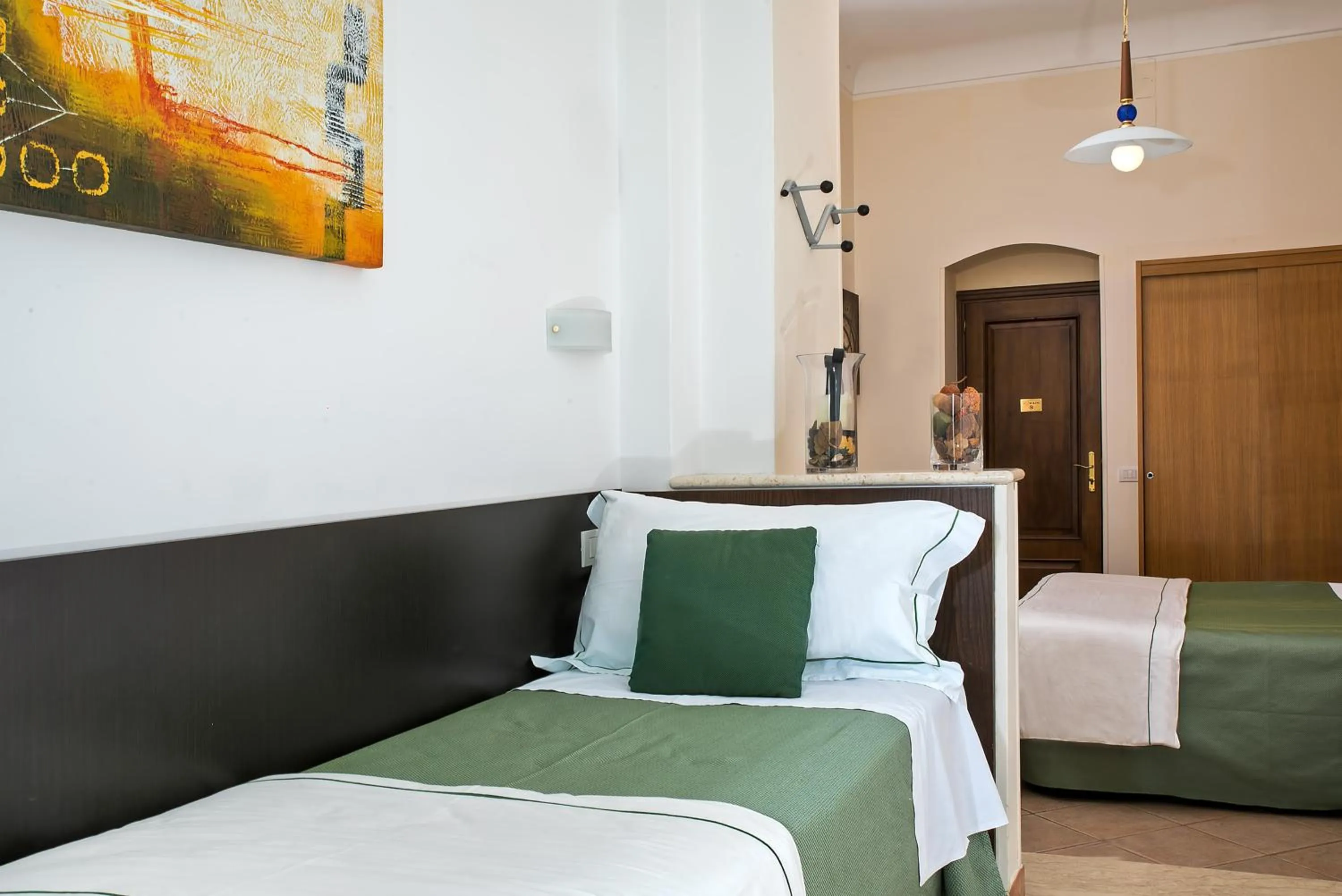 Bed in Hotel "La Pensione Svizzera"
