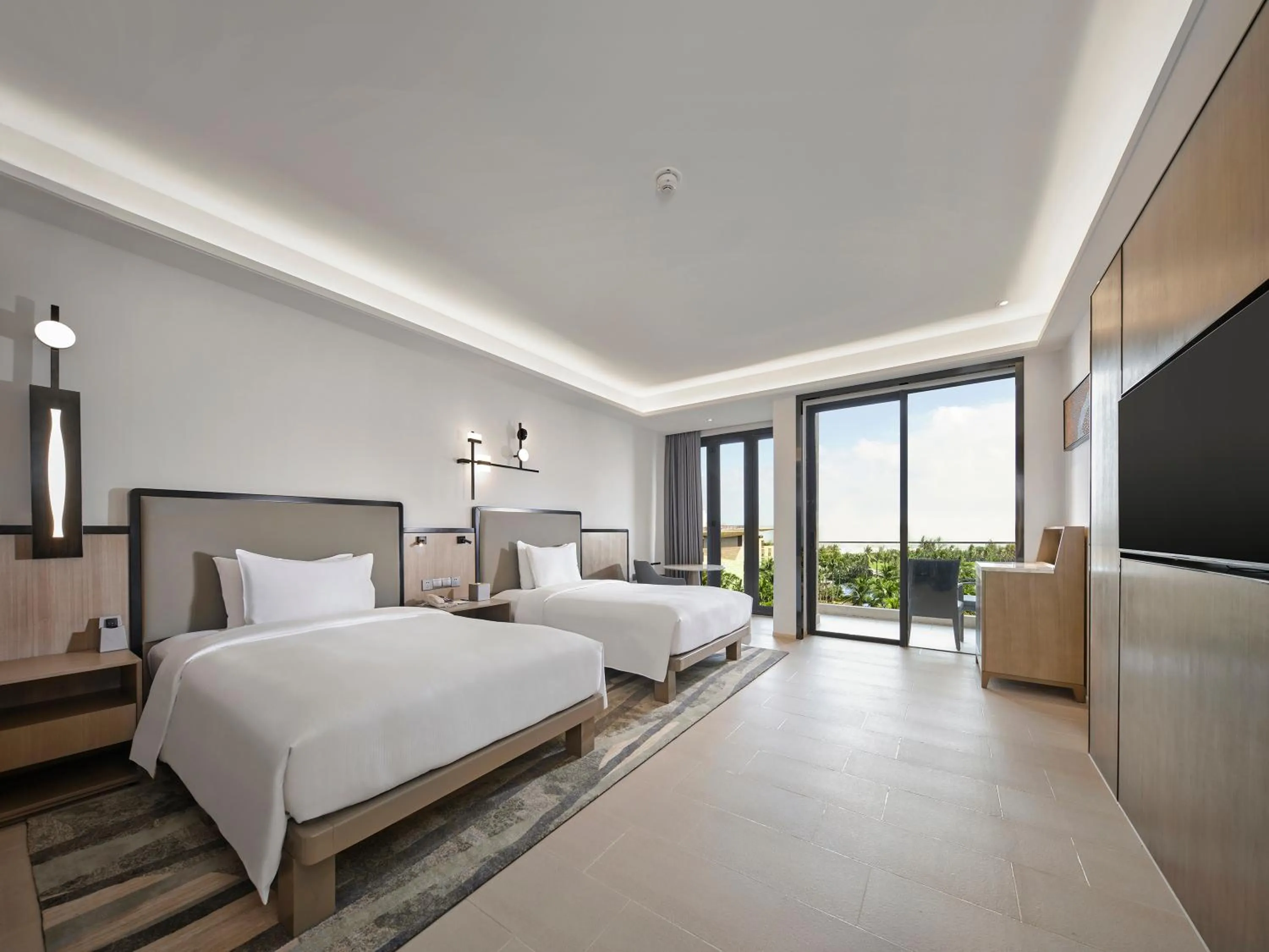 Photo of the whole room, Bed in Wanda Realm Resort Sanya Haitang Bay