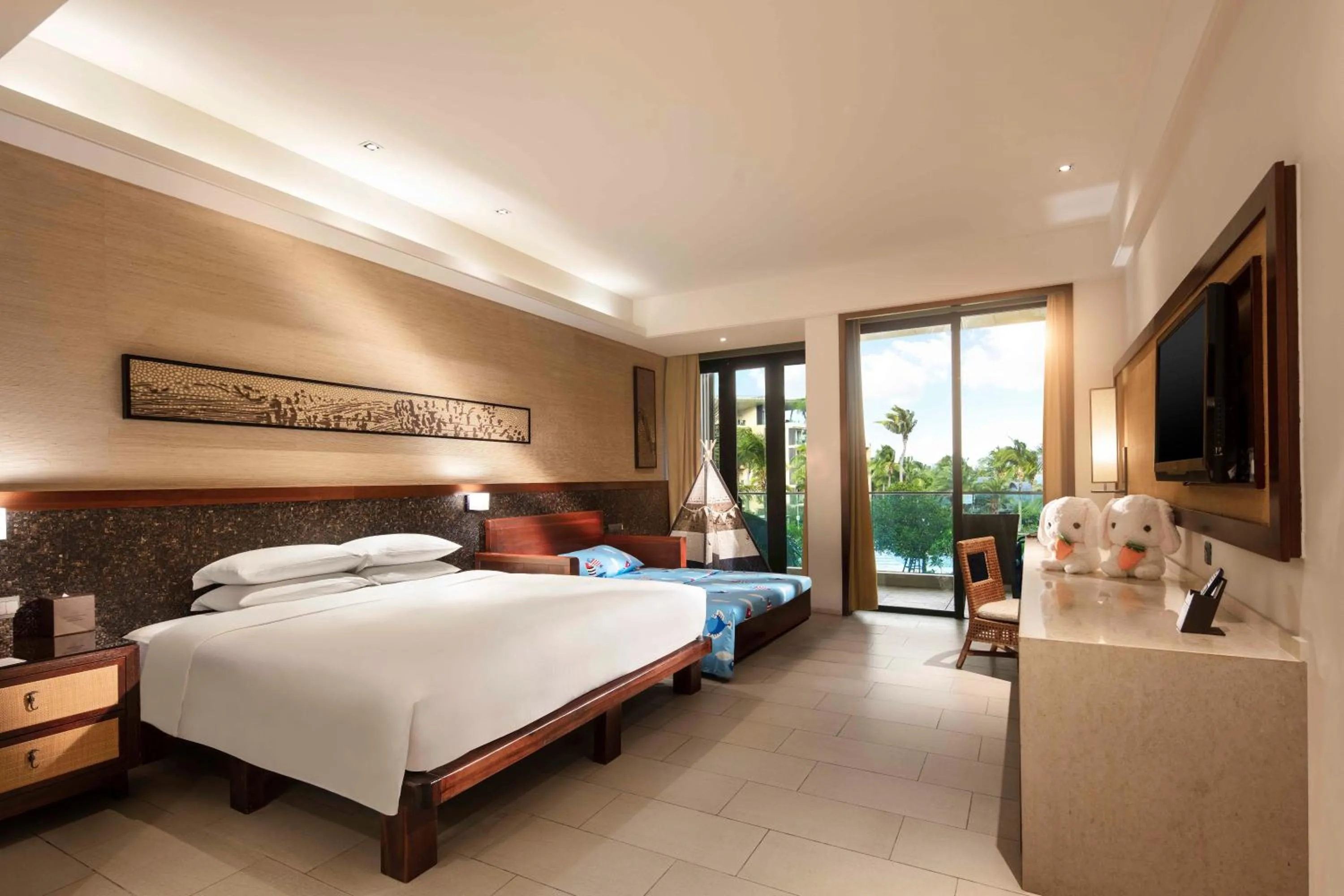 Photo of the whole room, Bed in Wanda Realm Resort Sanya Haitang Bay